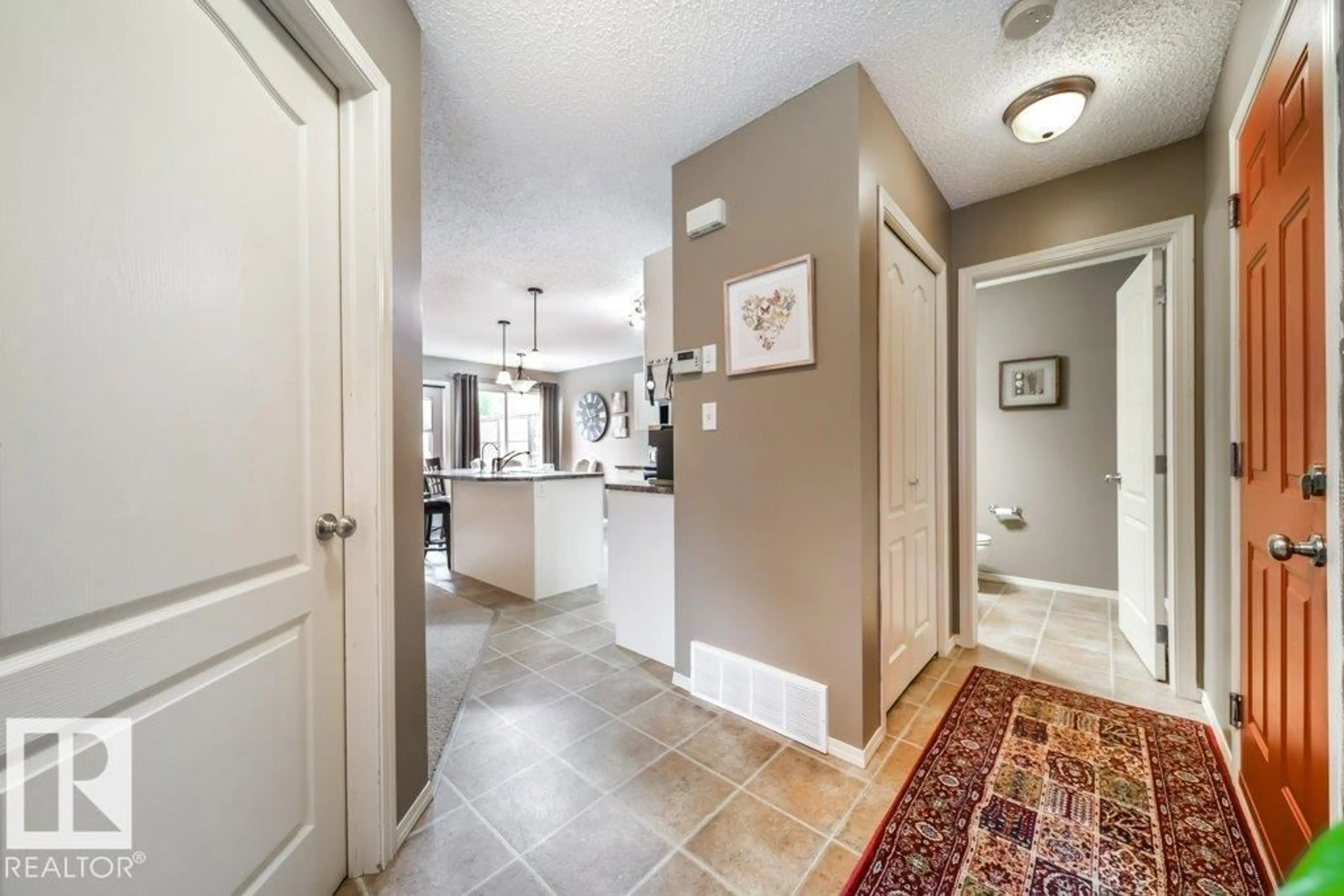 Indoor entryway for 8507 2 AV SW, Edmonton Alberta T6X1H5