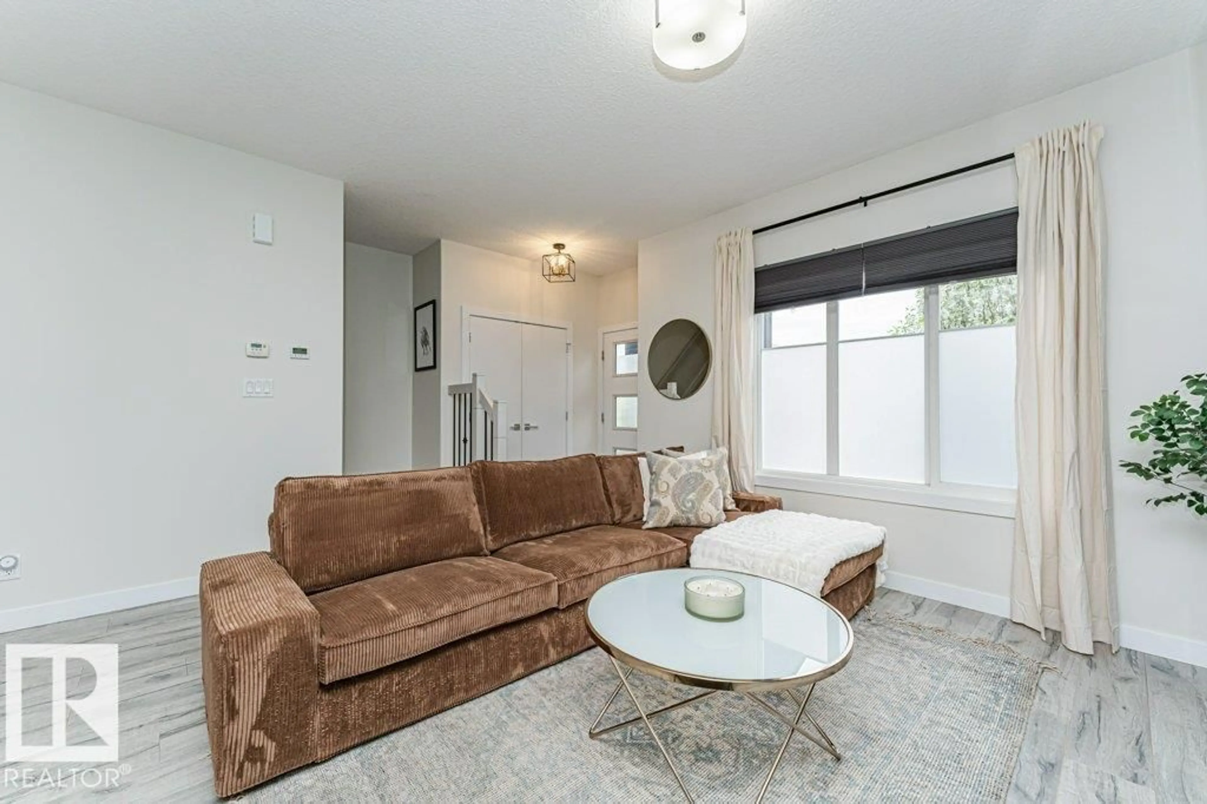 Living room with furniture, unknown for 721 BERG LO, Leduc Alberta T9E1G7