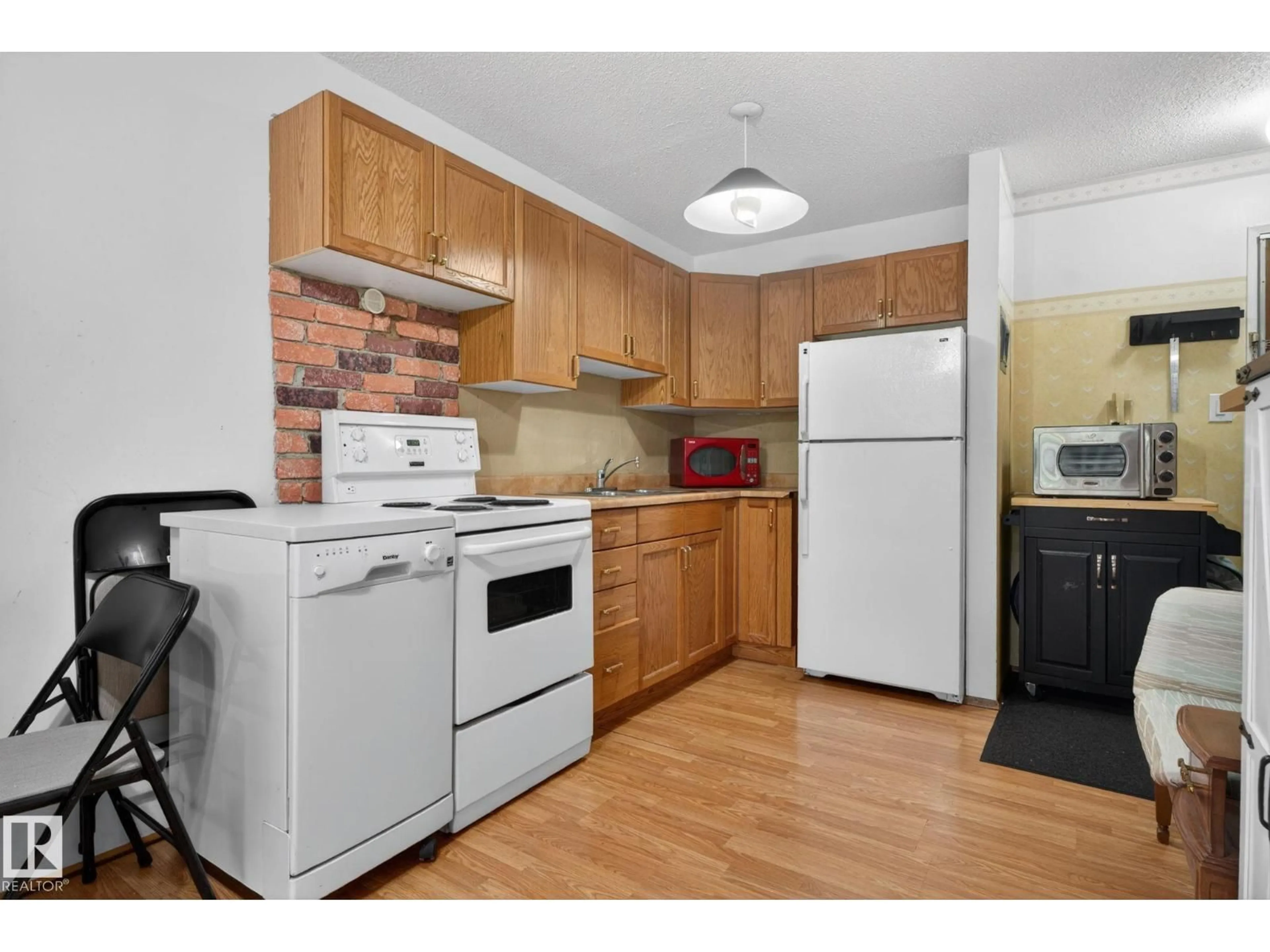 Standard kitchen, wood/laminate floor for #204 - 12404 114 AV NW, Edmonton Alberta T5M3M5
