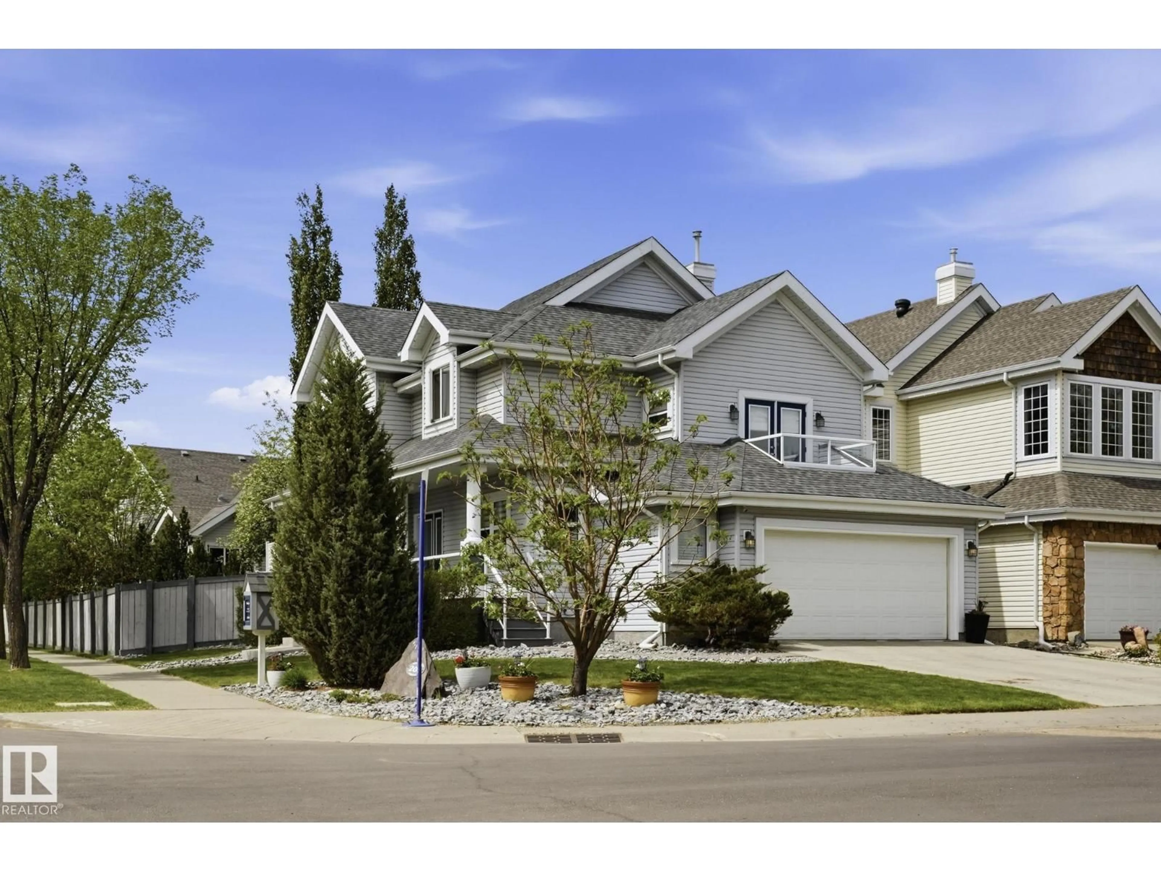 Home with vinyl exterior material, street for SW - 204 SHEPPARD CO, Edmonton Alberta T6X1B3