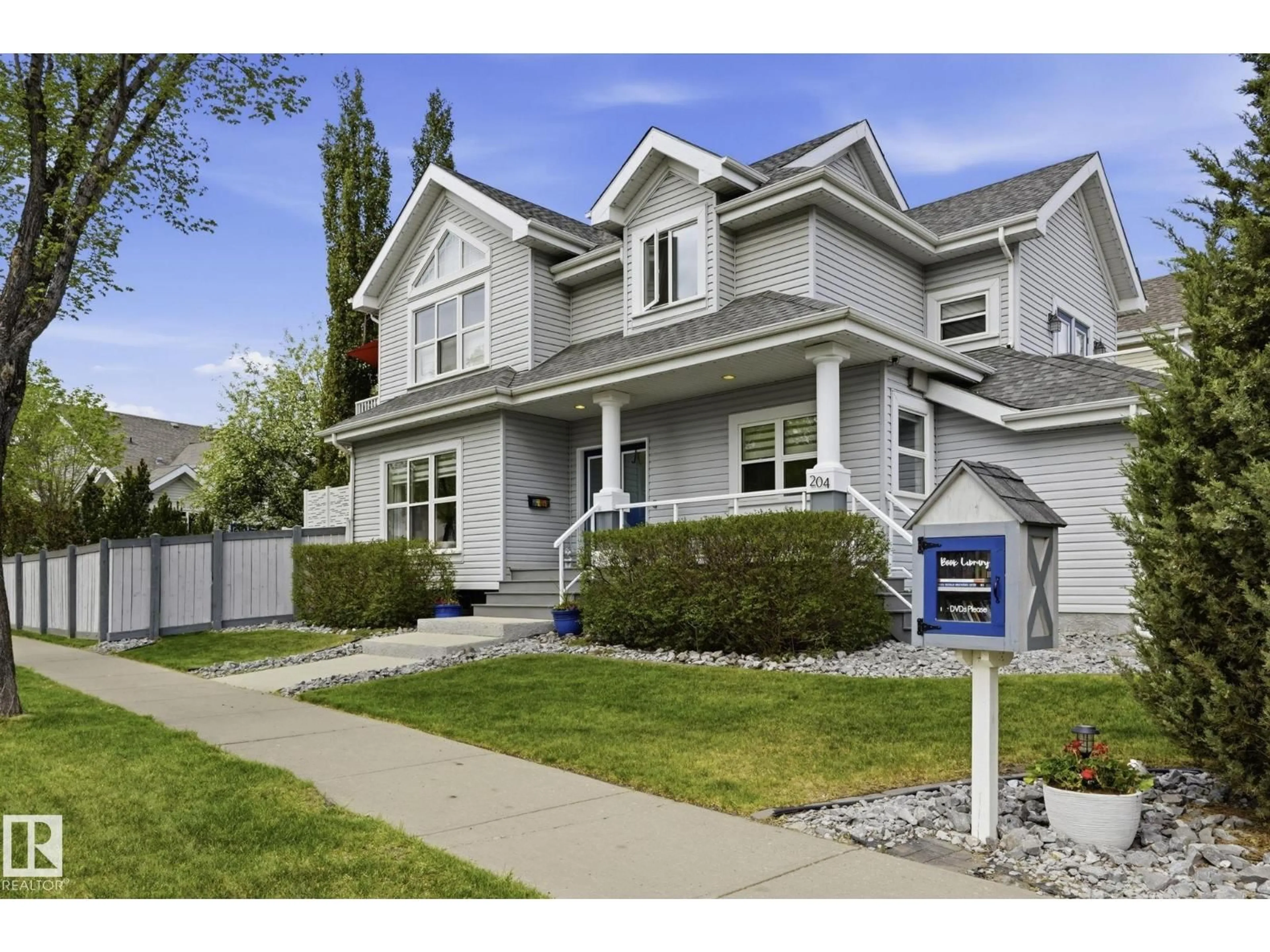 Home with vinyl exterior material, street for SW - 204 SHEPPARD CO, Edmonton Alberta T6X1B3