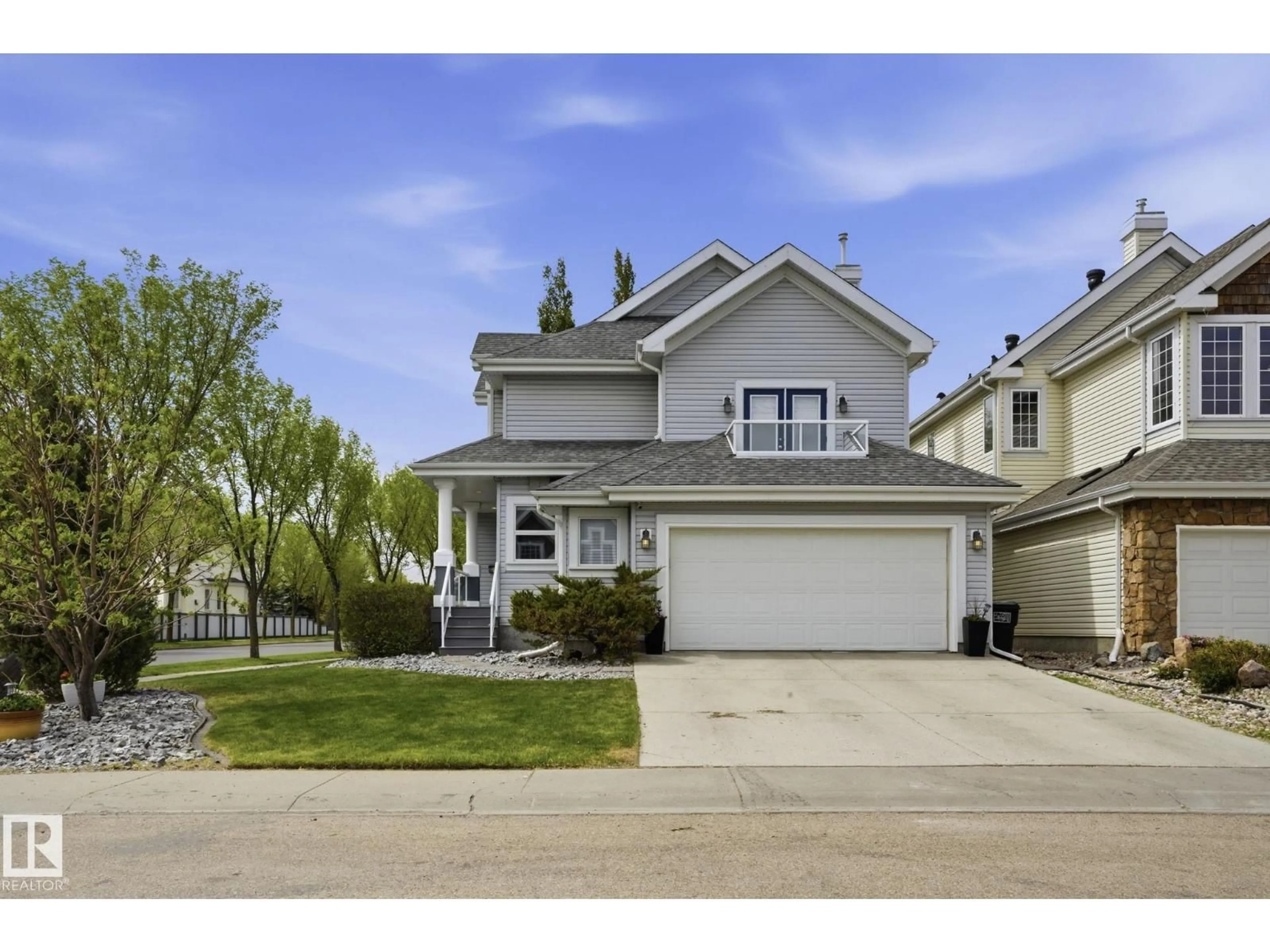 Home with vinyl exterior material, street for SW - 204 SHEPPARD CO, Edmonton Alberta T6X1B3