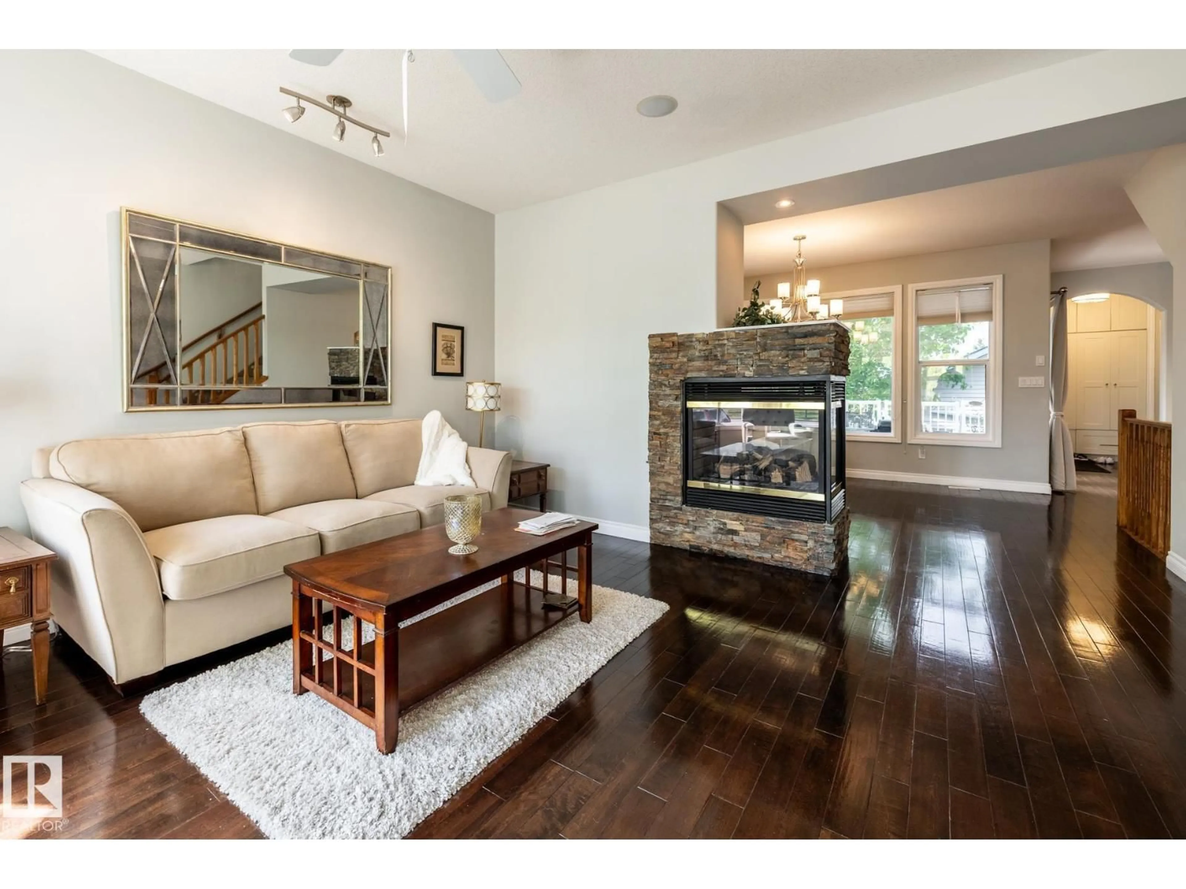 Living room with furniture, wood/laminate floor for 2036 TOWNE CENTRE BV, Edmonton Alberta T6R3M7