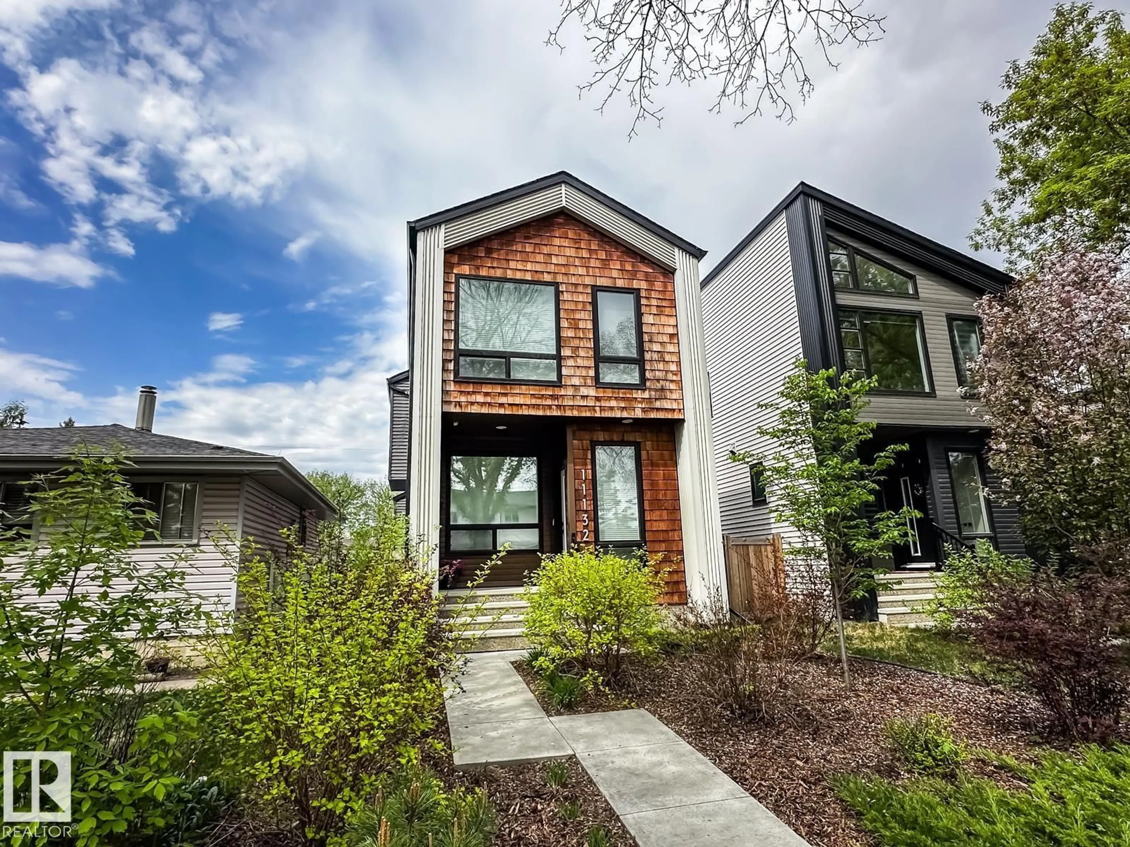 Home with brick exterior material, street for 11132 125 ST, Edmonton Alberta T5M0M3