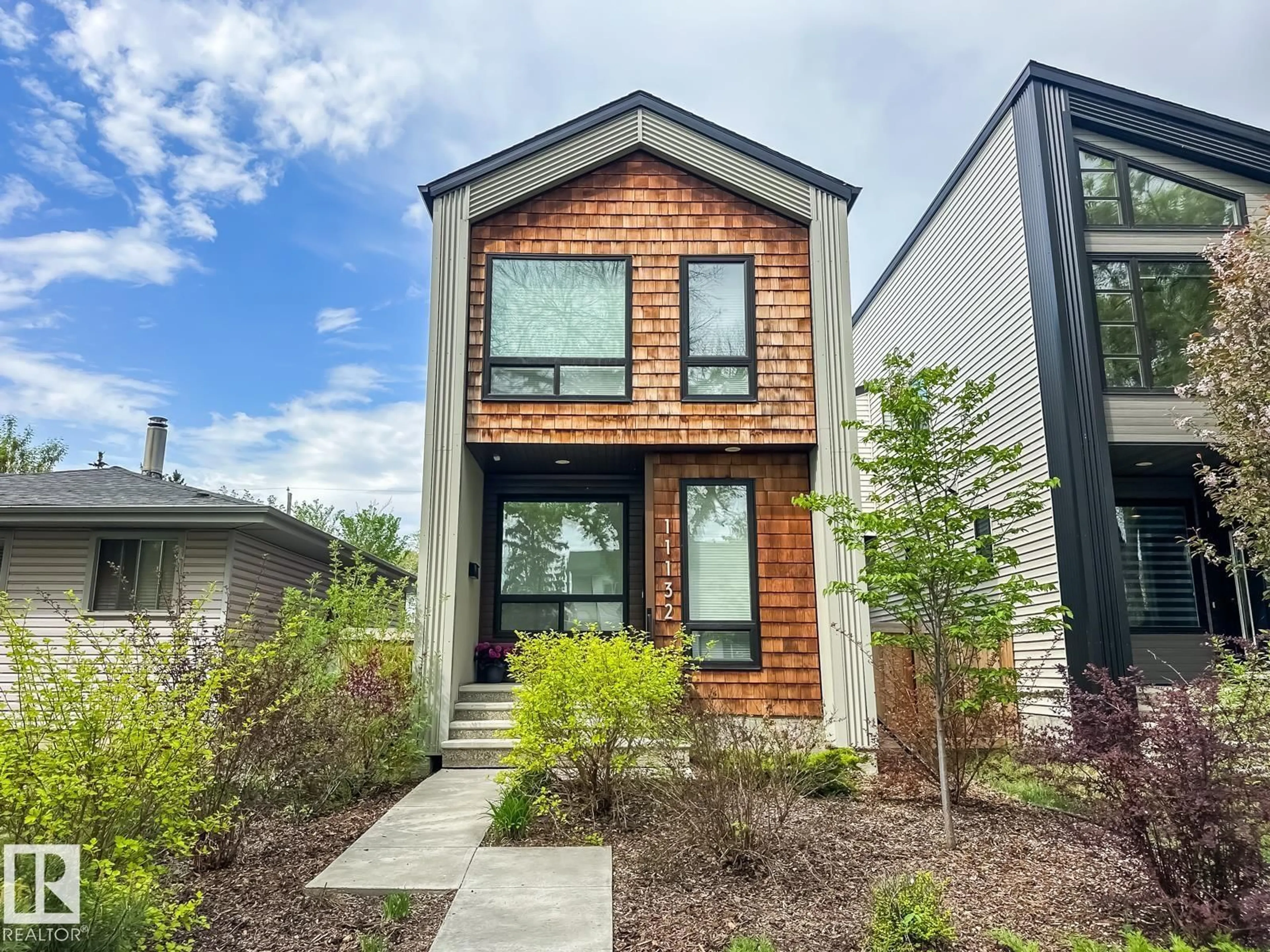 Home with brick exterior material, street for 11132 125 ST, Edmonton Alberta T5M0M3