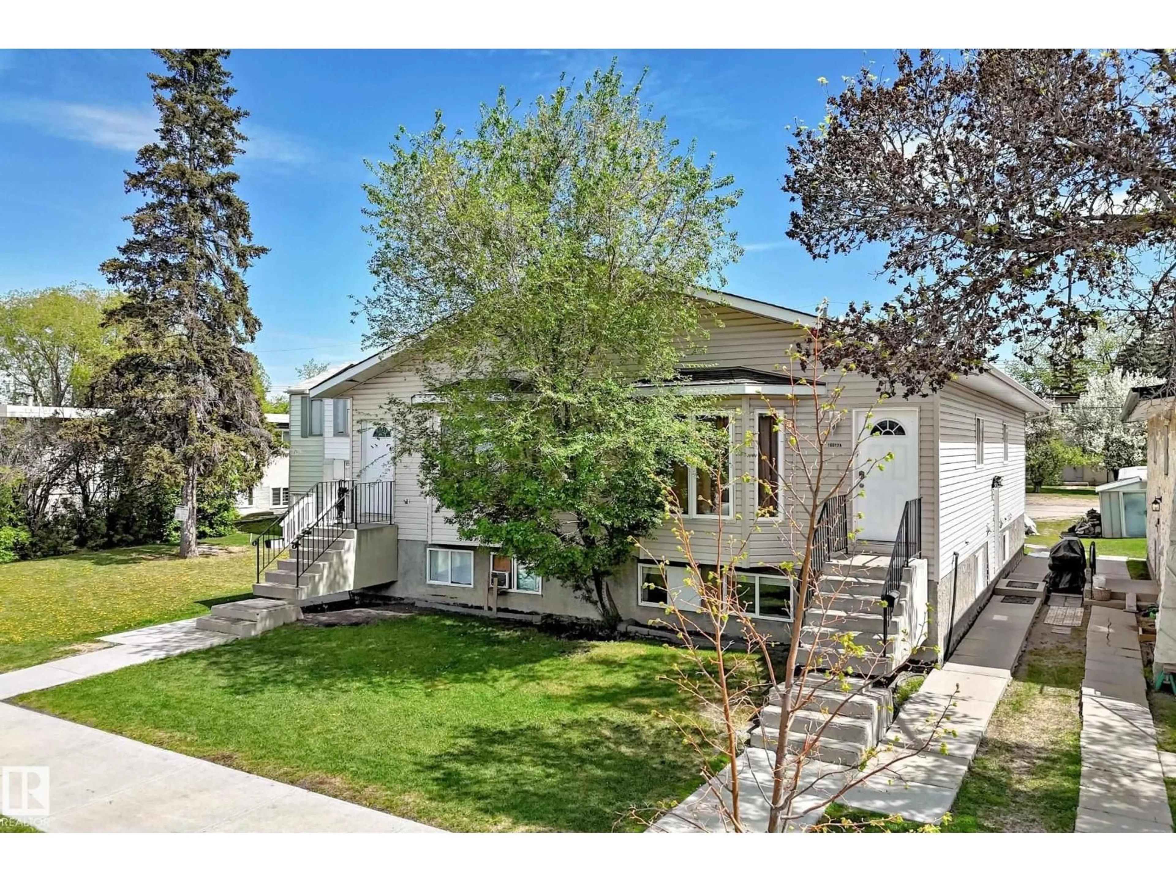 Home with vinyl exterior material, street for NW - 10017 153 ST, Edmonton Alberta T5P3B2