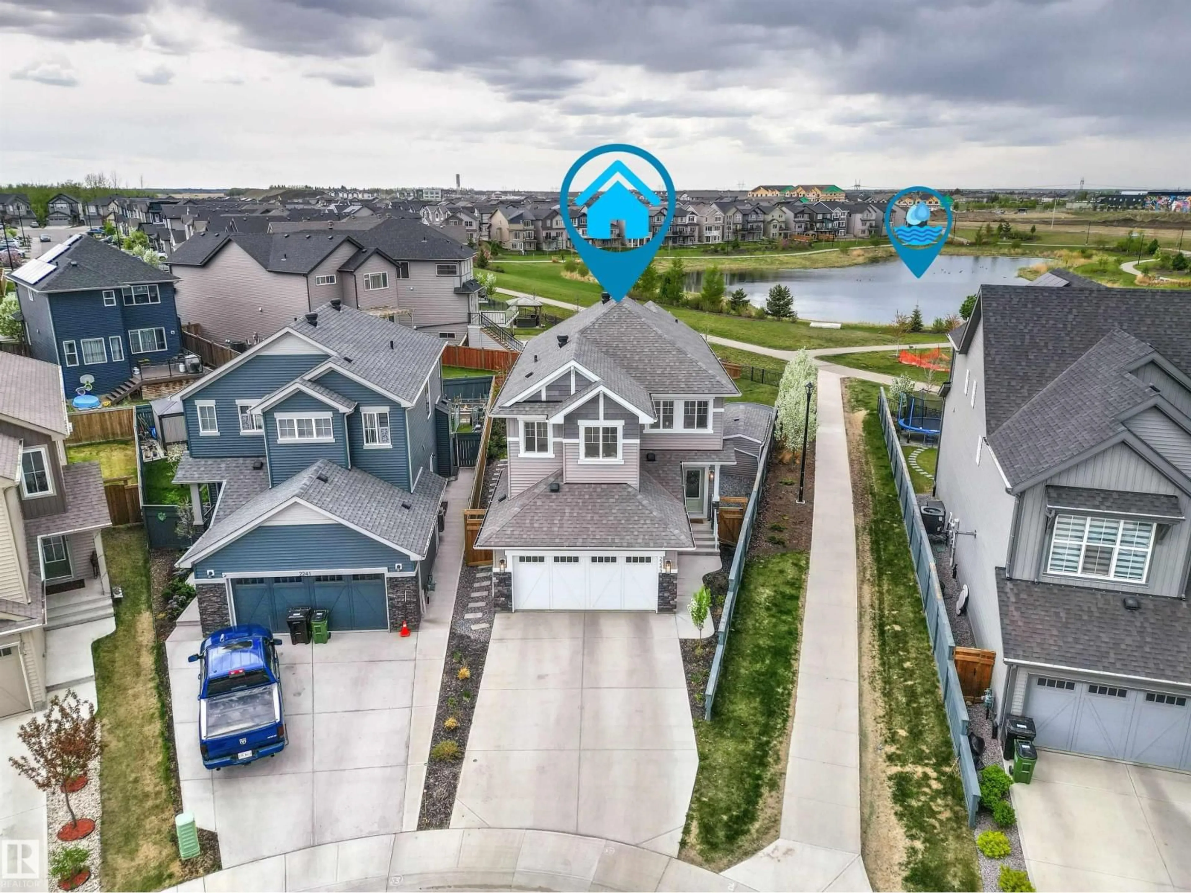 A pic from outside/outdoor area/front of a property/back of a property/a pic from drone, water/lake/river/ocean view for SW - 2243 DONAGHEY WY, Edmonton Alberta T6W5G1