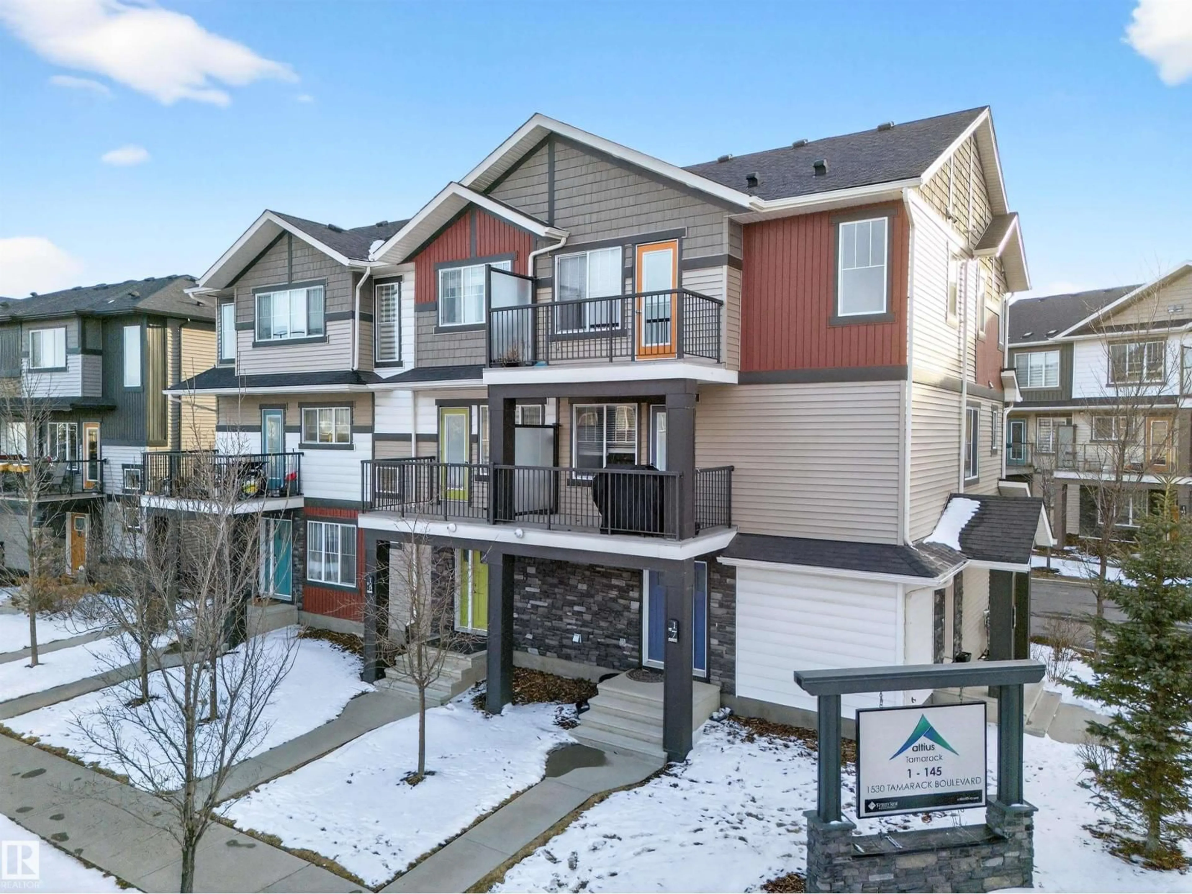 A pic from outside/outdoor area/front of a property/back of a property/a pic from drone, mountain view for 16 1530 TAMARACK BV, Edmonton Alberta T6T2E6