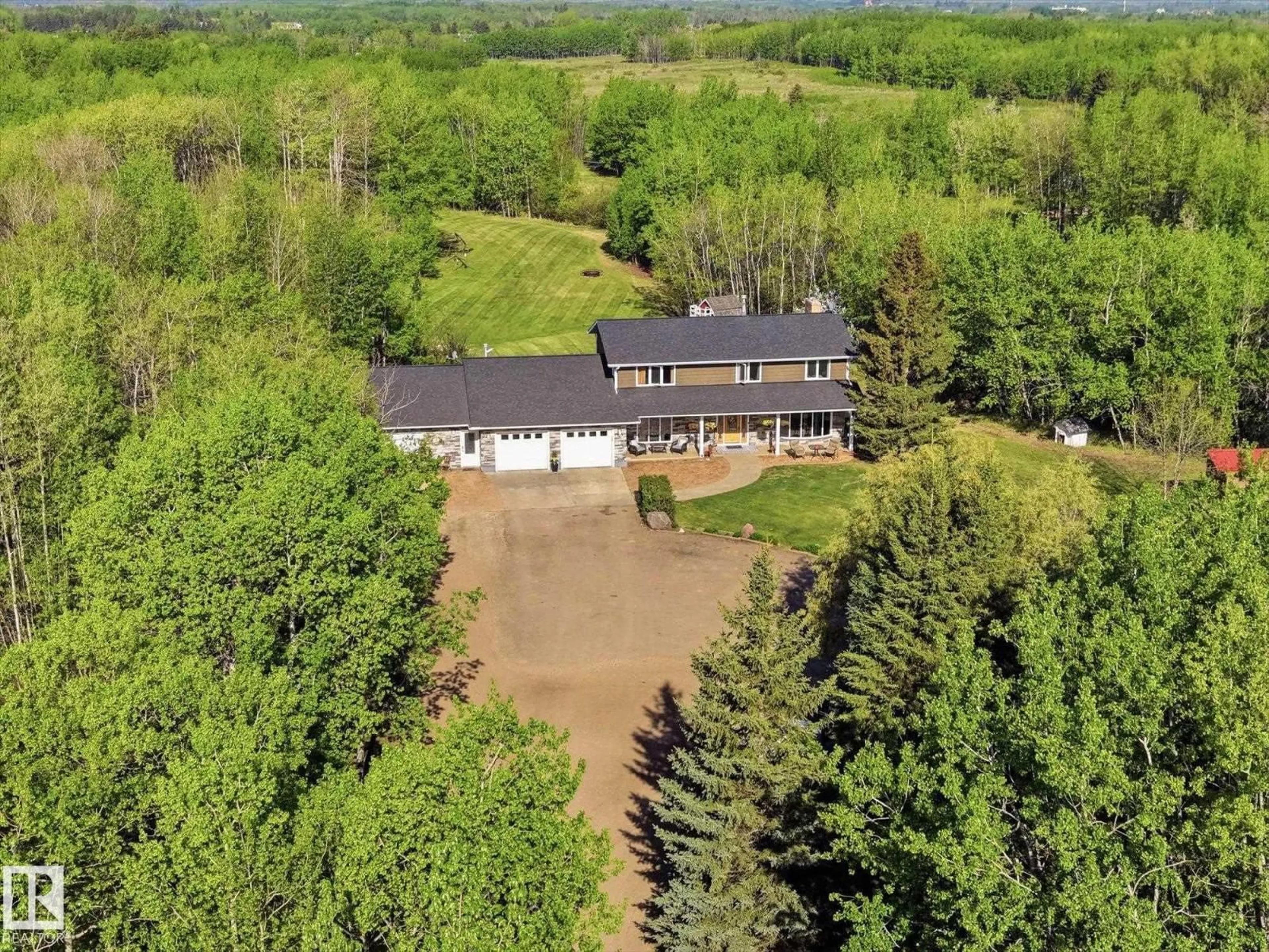 A pic from outside/outdoor area/front of a property/back of a property/a pic from drone, unknown for 51408 RGE ROAD 224, Rural Strathcona County Alberta T8C1H5