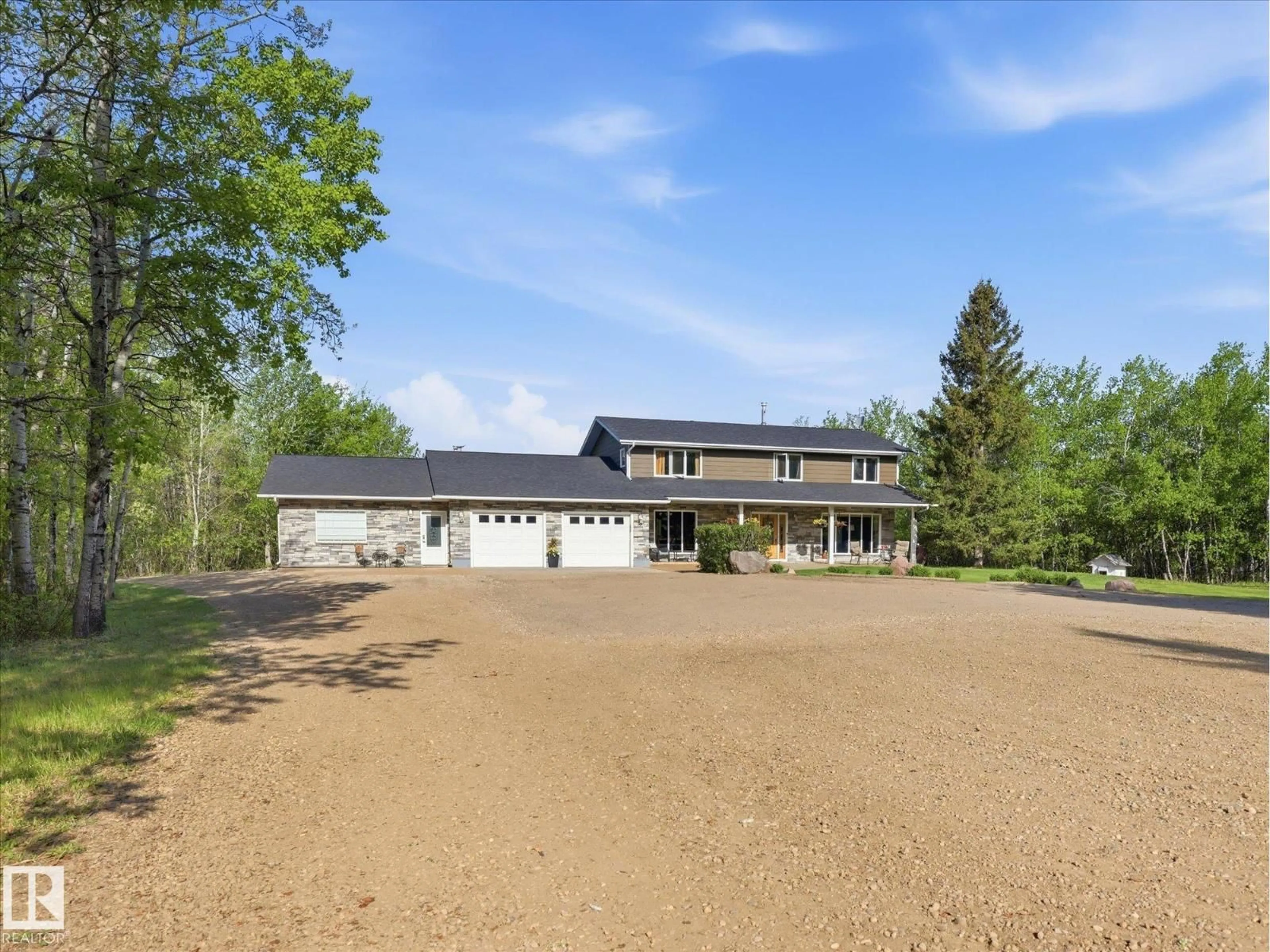 A pic from outside/outdoor area/front of a property/back of a property/a pic from drone, street for 51408 RGE ROAD 224, Rural Strathcona County Alberta T8C1H5