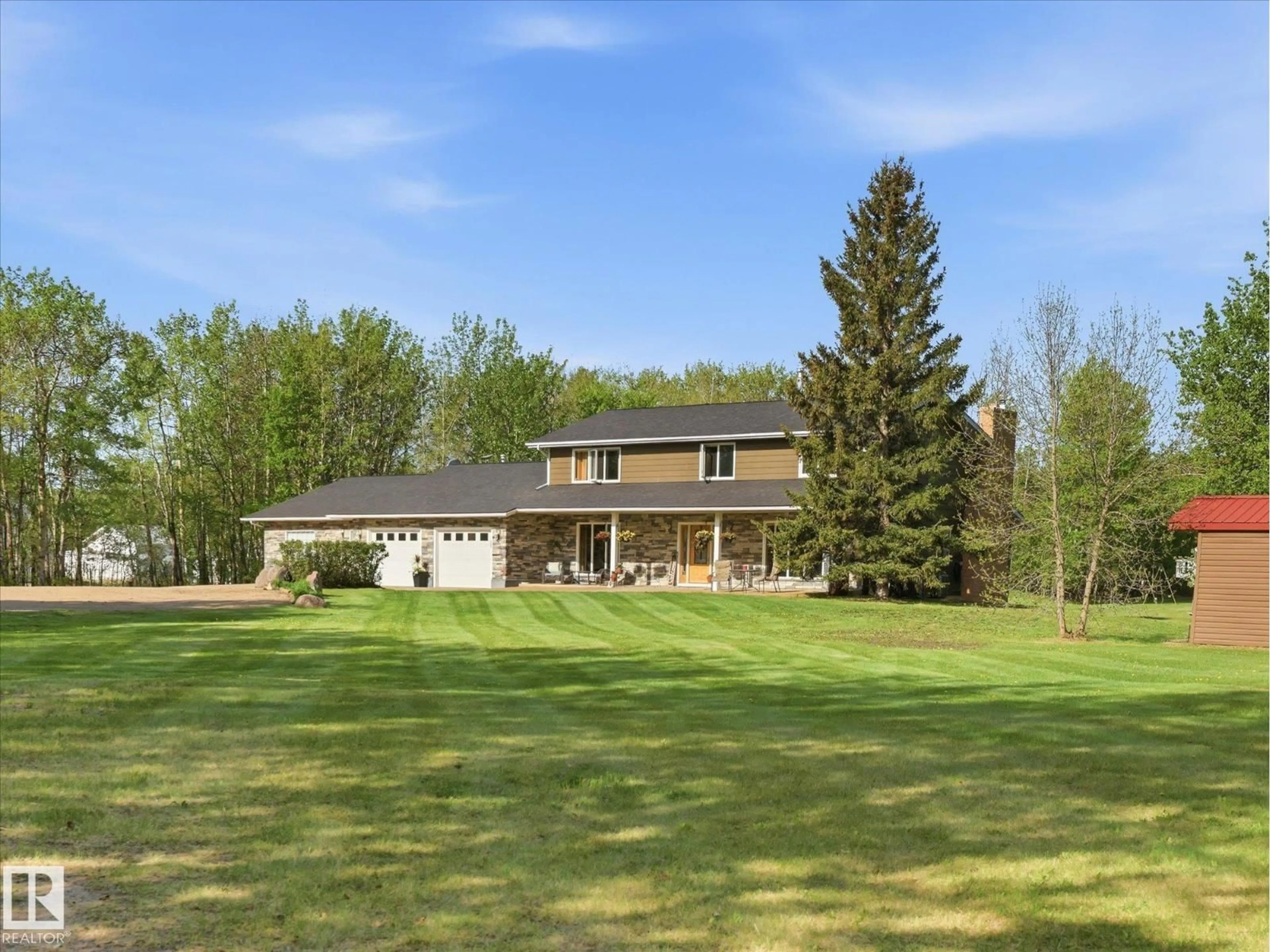 A pic from outside/outdoor area/front of a property/back of a property/a pic from drone, unknown for 51408 RGE ROAD 224, Rural Strathcona County Alberta T8C1H5