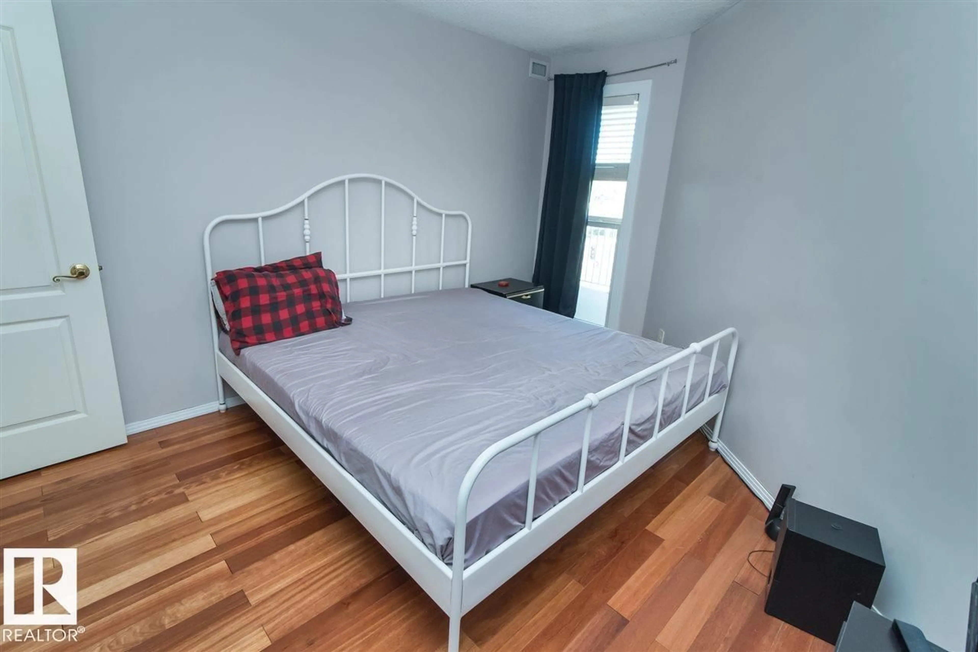 Bedroom with bed, wood/laminate floor for #211 - 9640 105 ST, Edmonton Alberta T5K0Z7