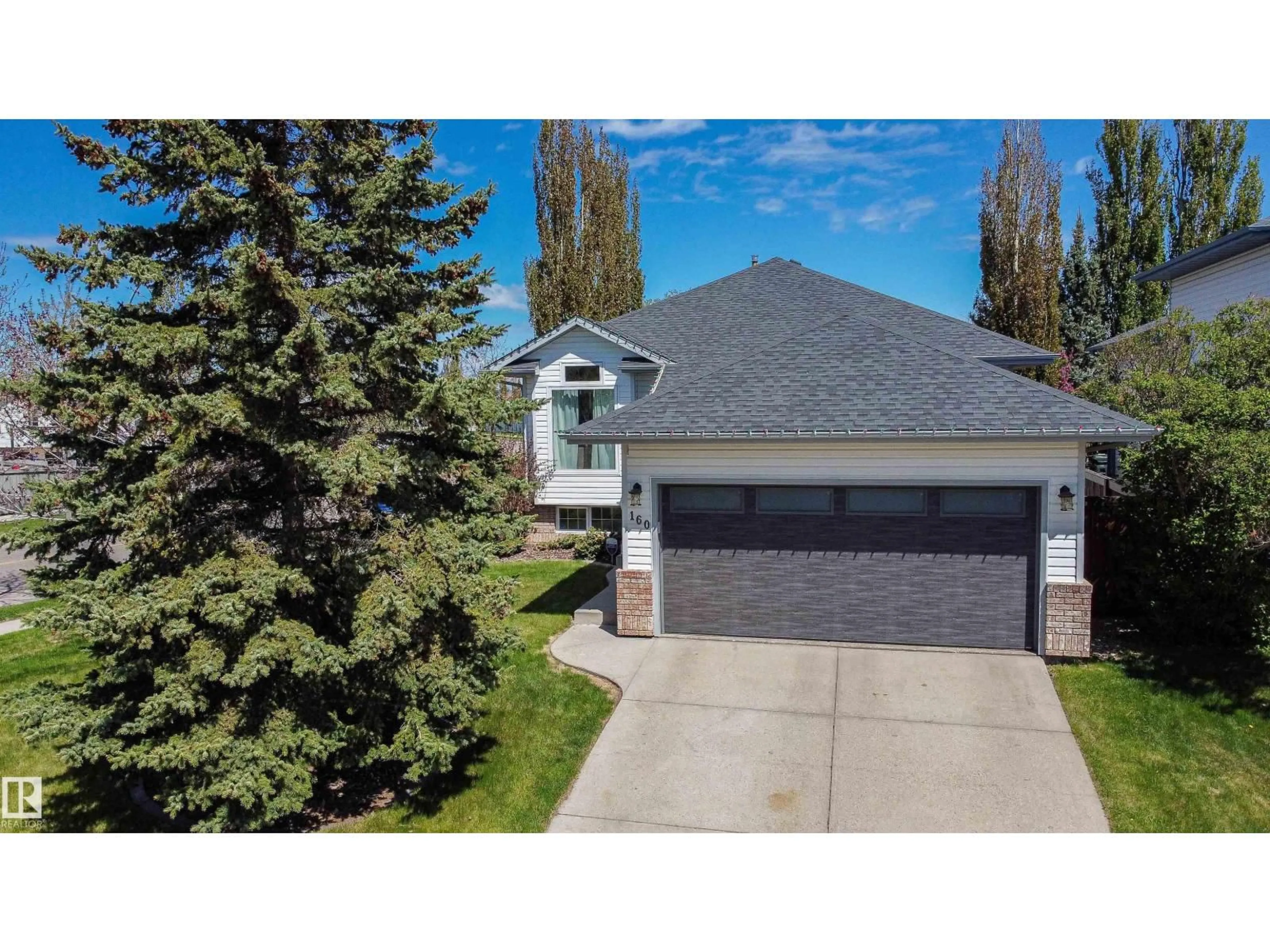 A pic from outside/outdoor area/front of a property/back of a property/a pic from drone, street for 160 REGENCY DR, Sherwood Park Alberta T8A5R9