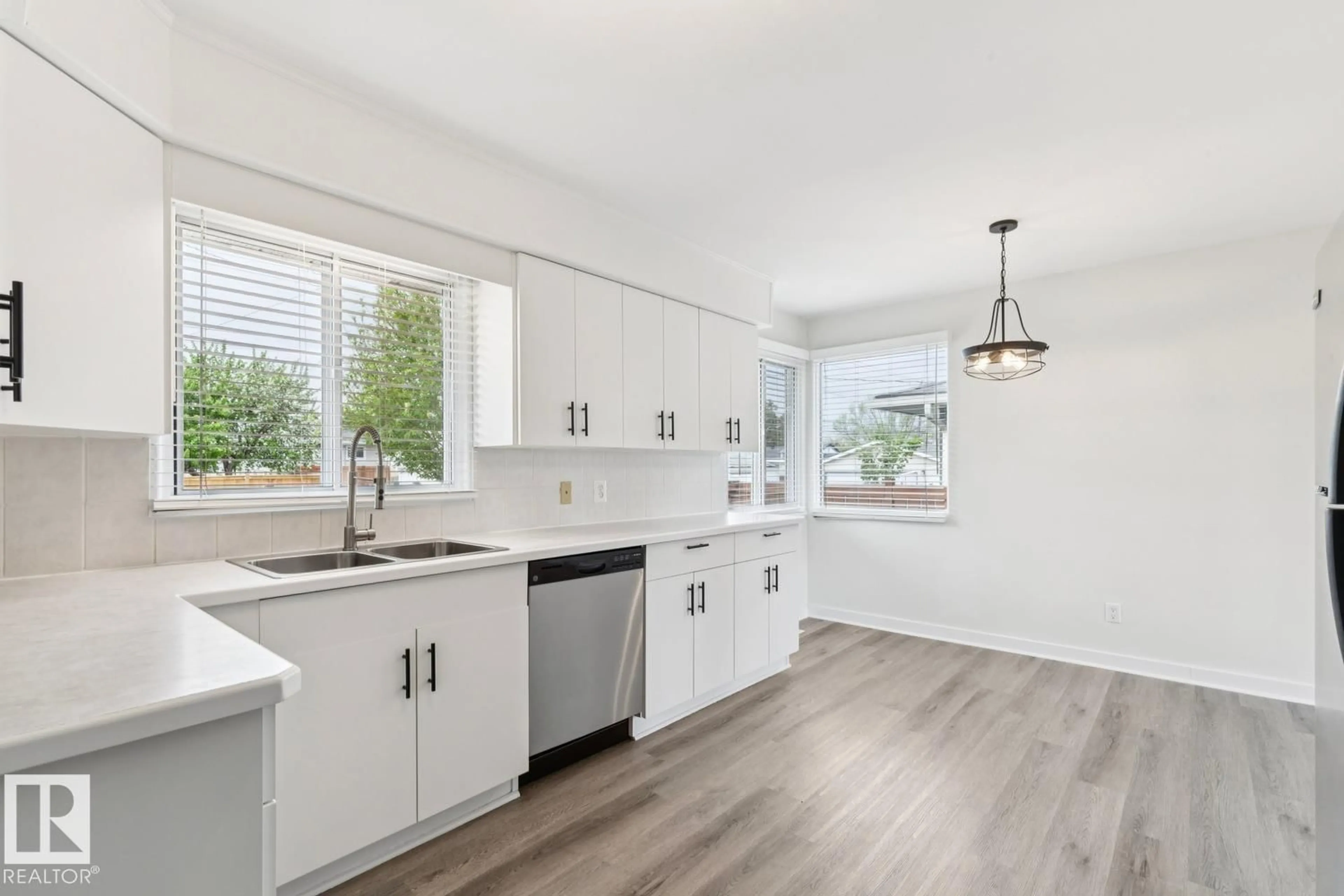 Open concept kitchen, unknown for 5203 103 AV, Edmonton Alberta T6A0T1