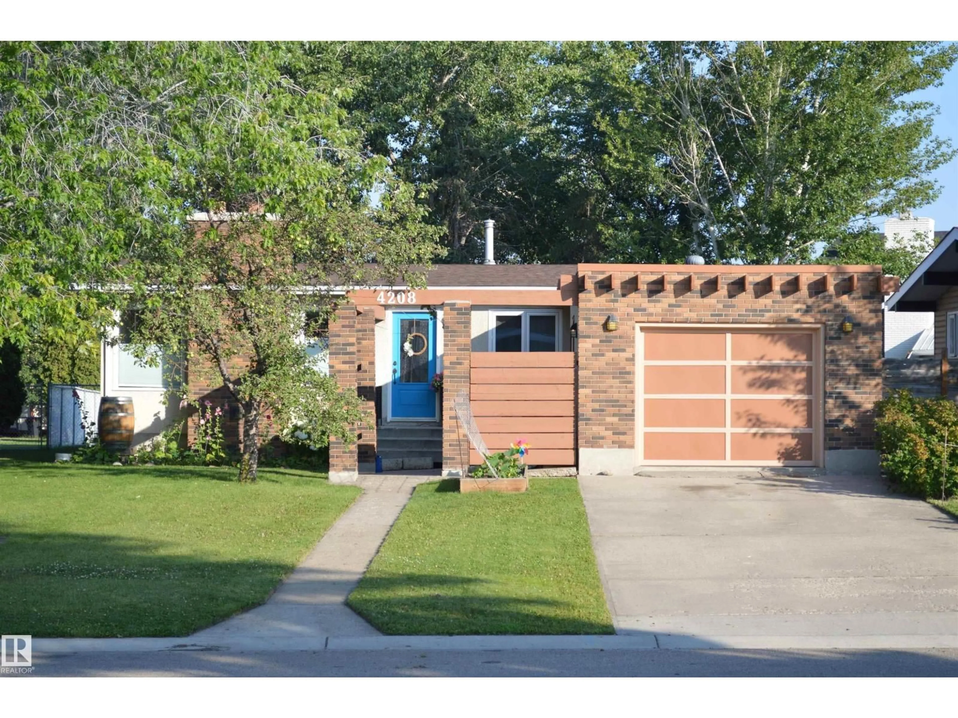 Home with brick exterior material, street for 4208 89 ST, Edmonton Alberta T6K1B9