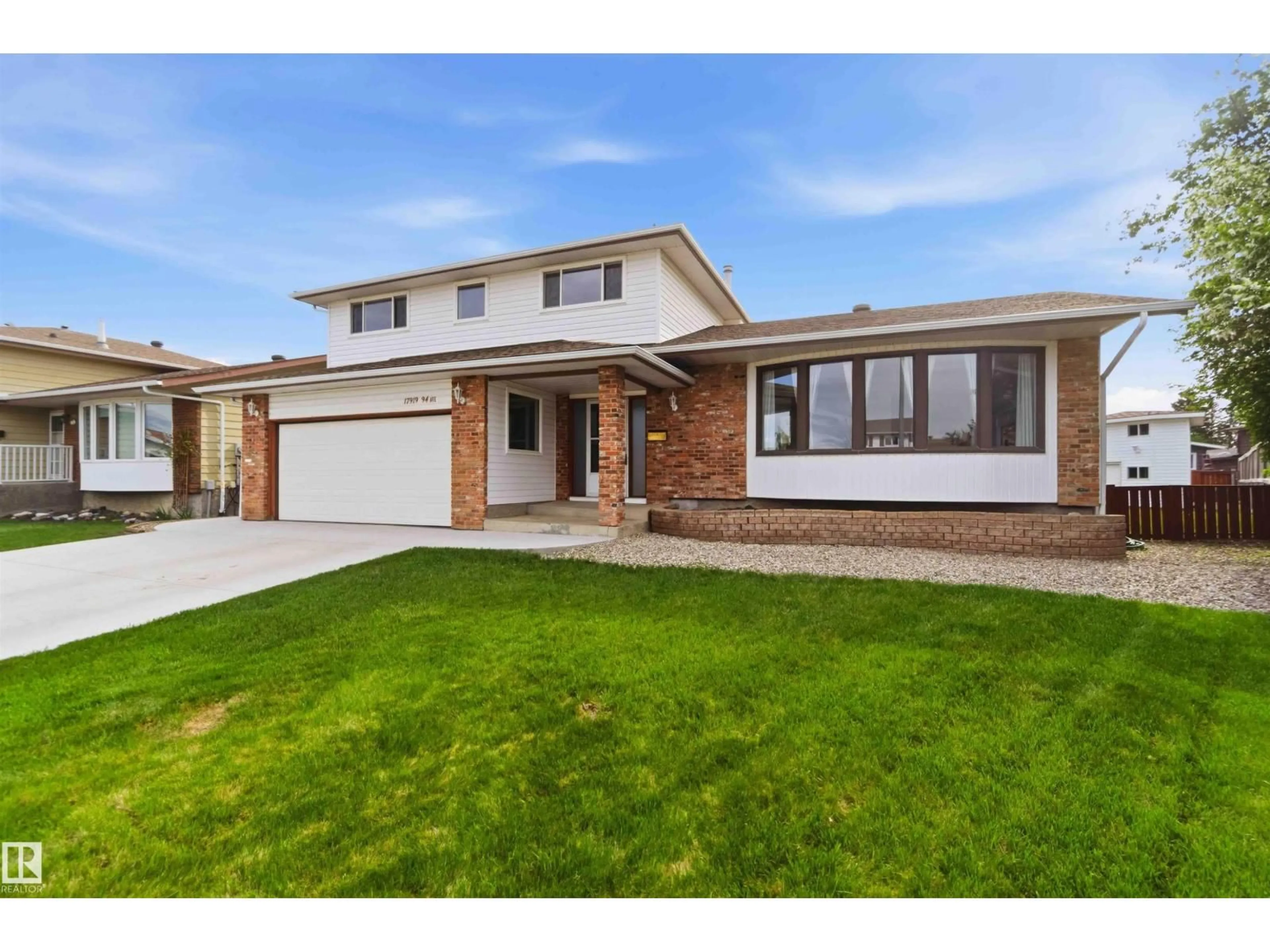 Home with brick exterior material, street for 17919 94 AV, Edmonton Alberta T5T1Y3
