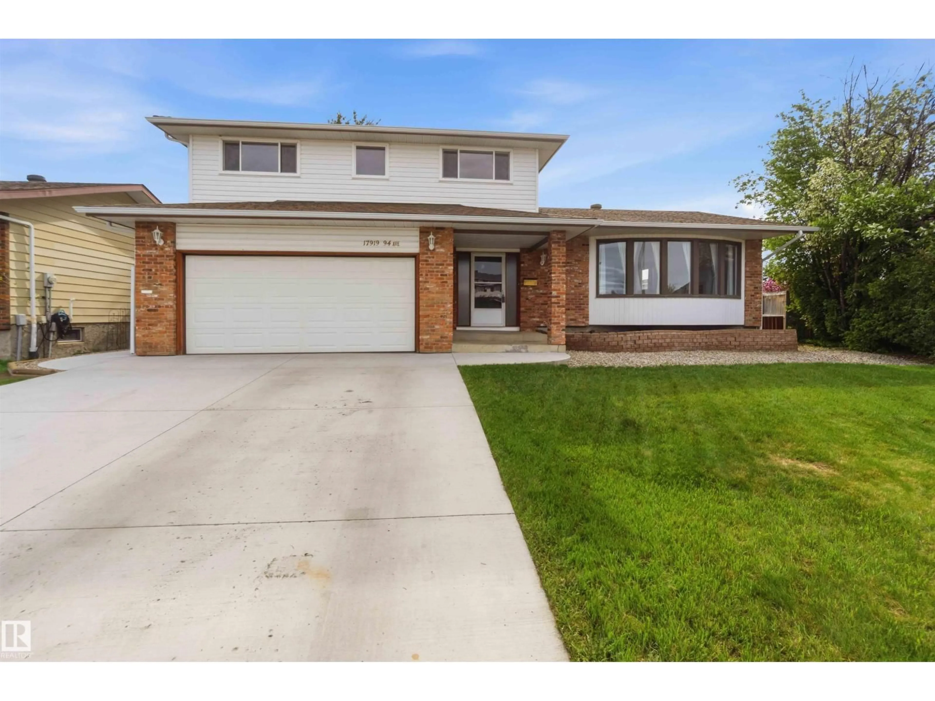 Home with brick exterior material, street for 17919 94 AV, Edmonton Alberta T5T1Y3