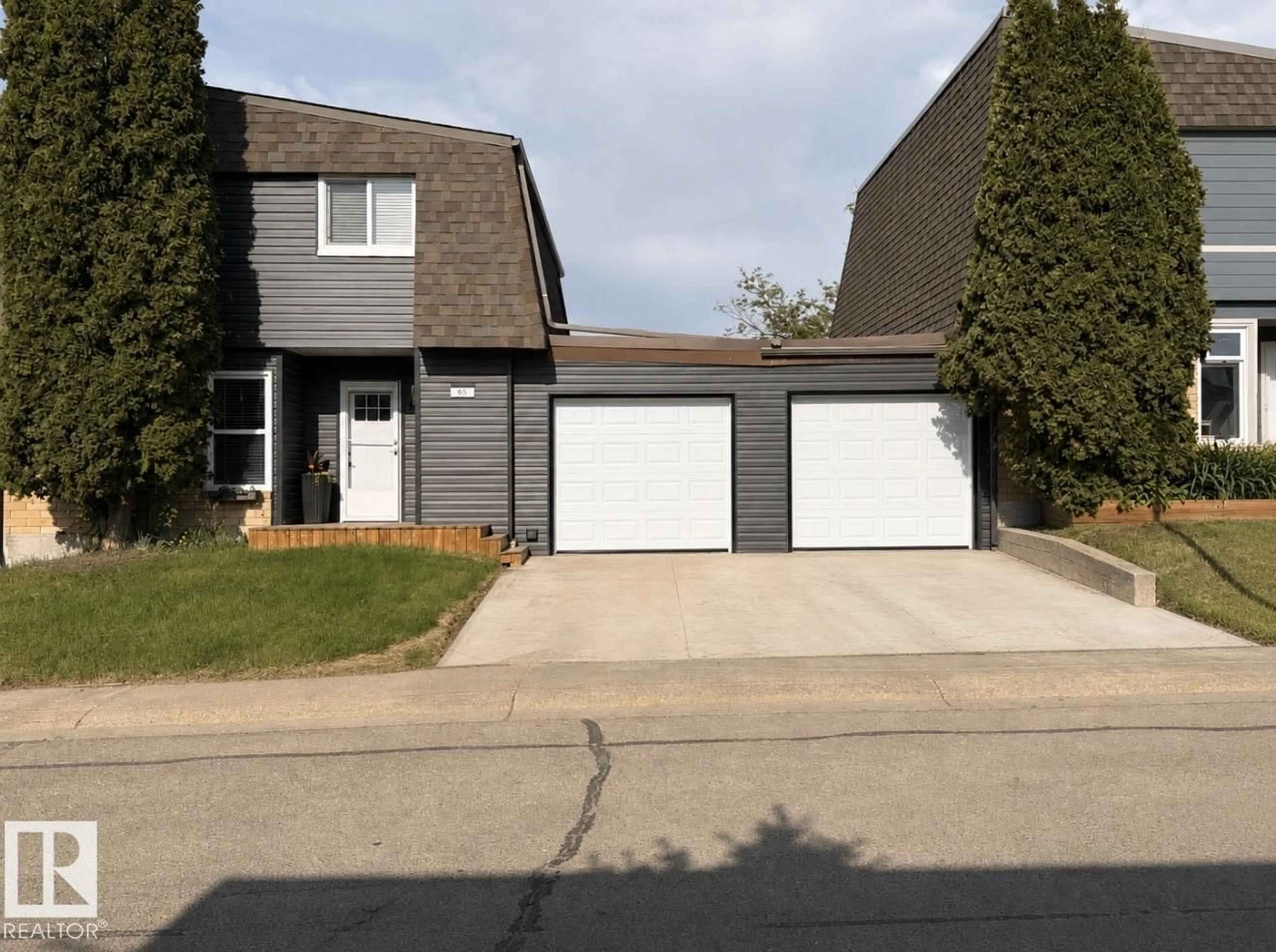 Home with vinyl exterior material, street for 65 GREENFIELD ES, St. Albert Alberta T8N2G2