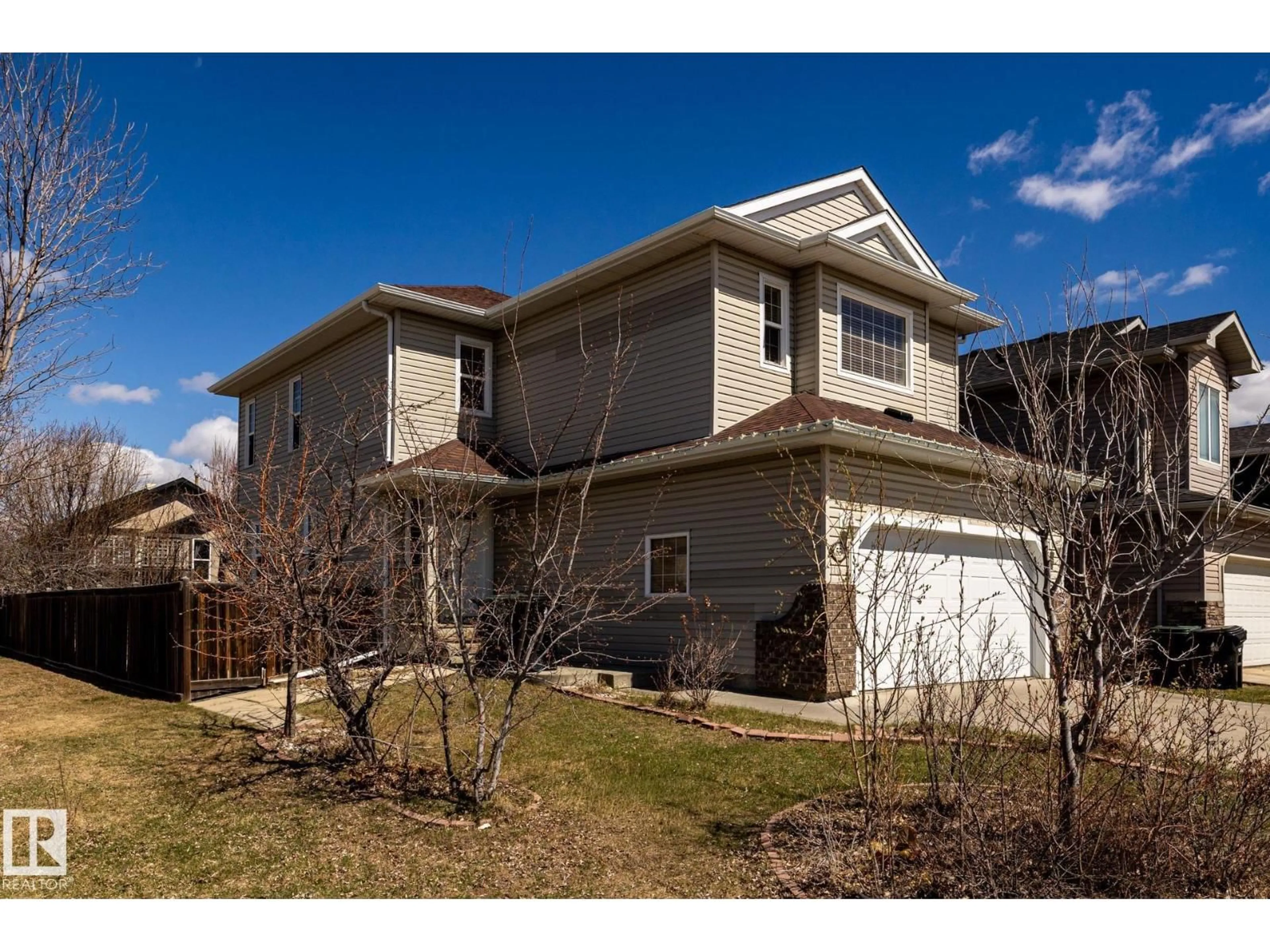 Home with vinyl exterior material, street for 55 LAMPLIGHT CV, Spruce Grove Alberta T7X4R2