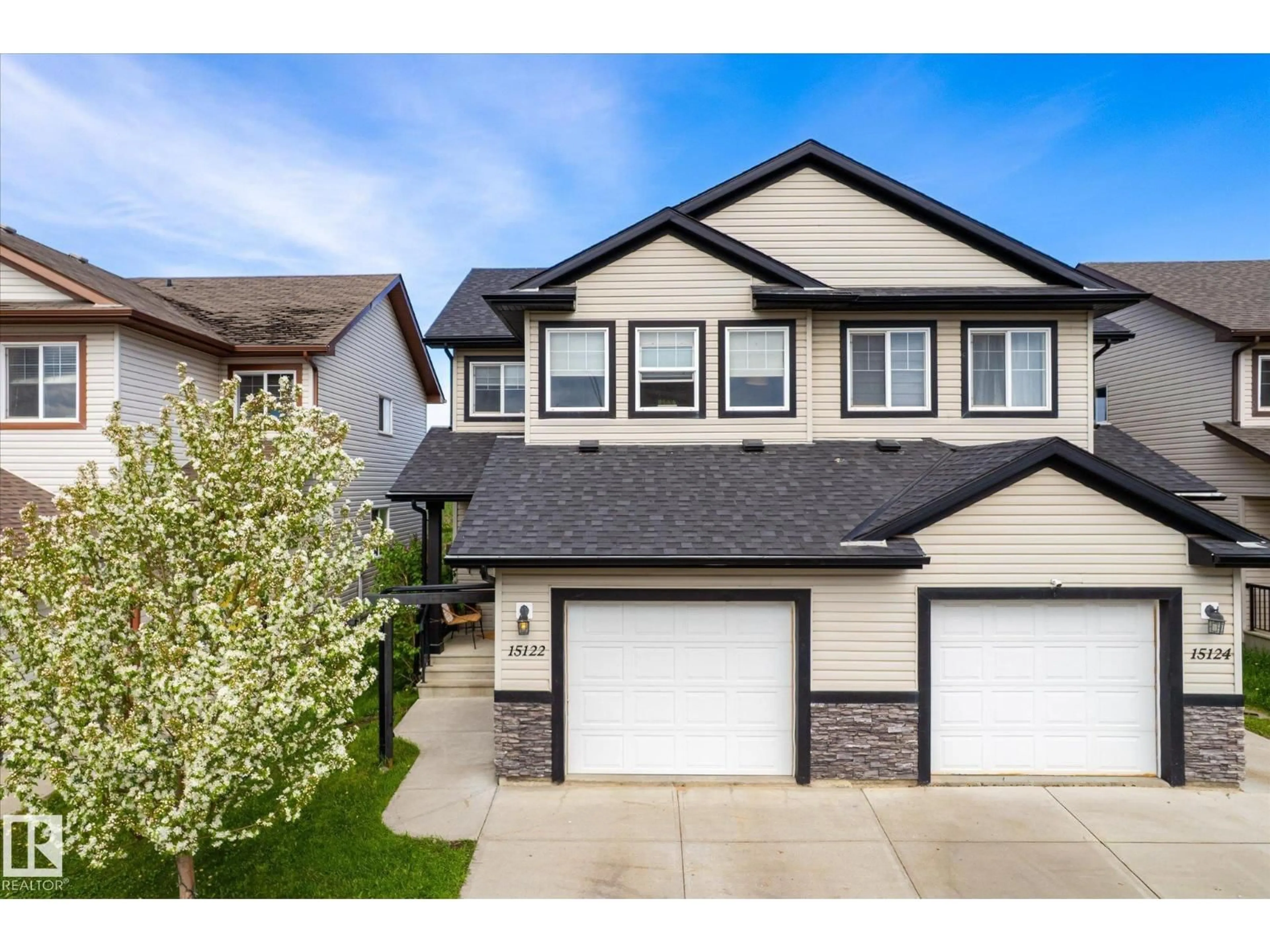 Home with vinyl exterior material, street for 15122 33 ST, Edmonton Alberta T5Y0J7