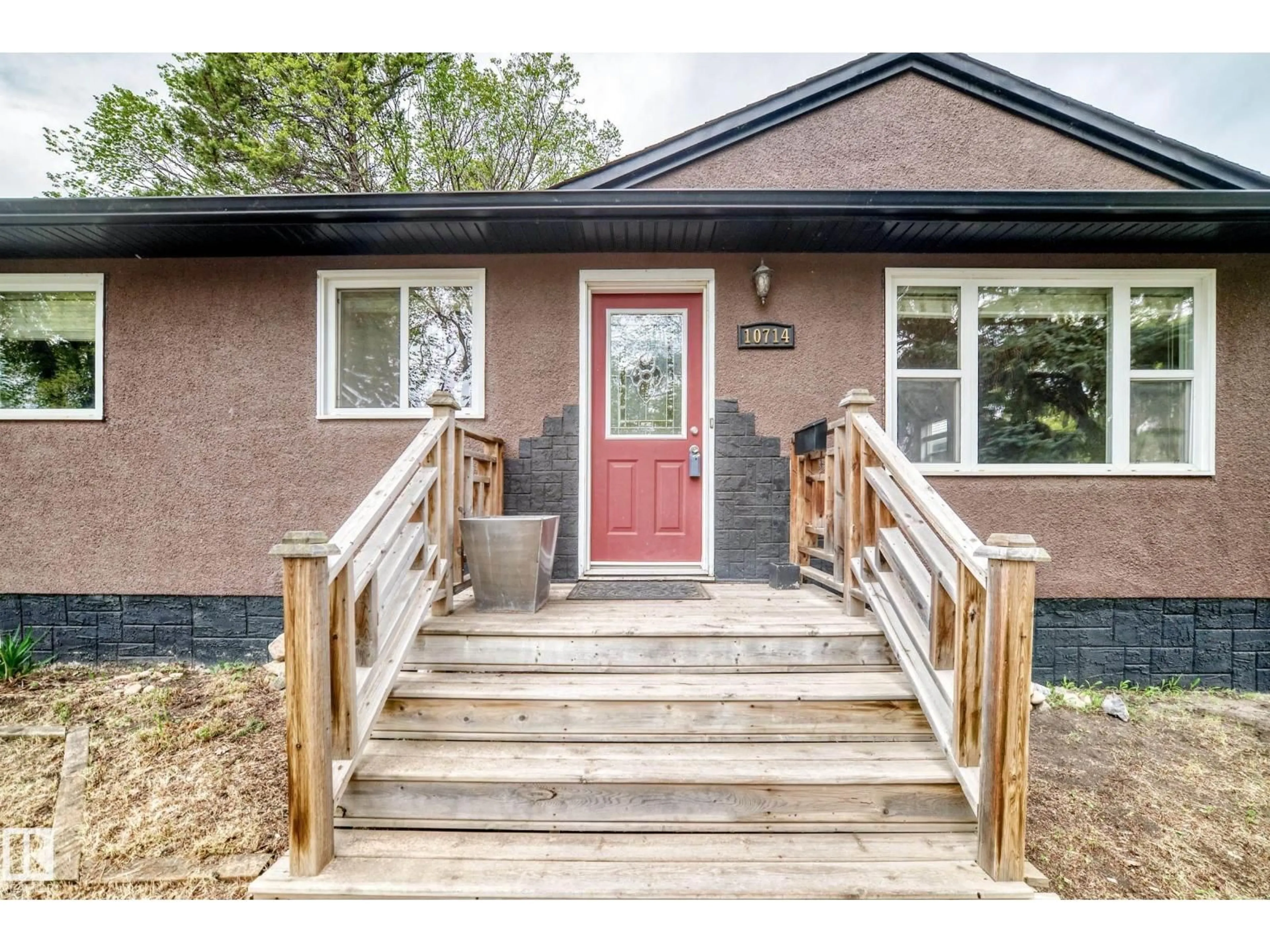 Home with brick exterior material, street for 10714 135 ST NW, Edmonton Alberta T5M1J6