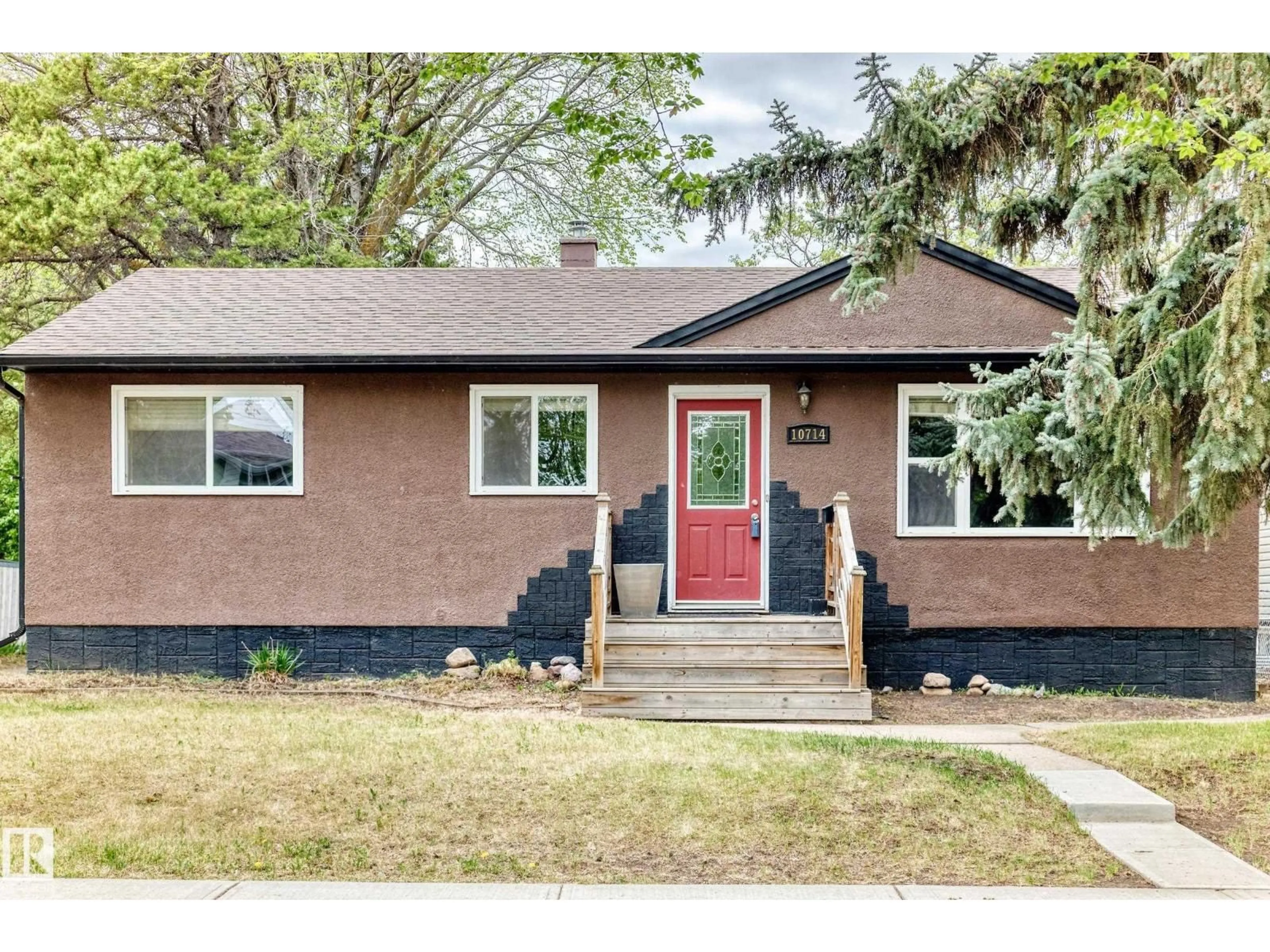 Home with brick exterior material, street for 10714 135 ST NW, Edmonton Alberta T5M1J6