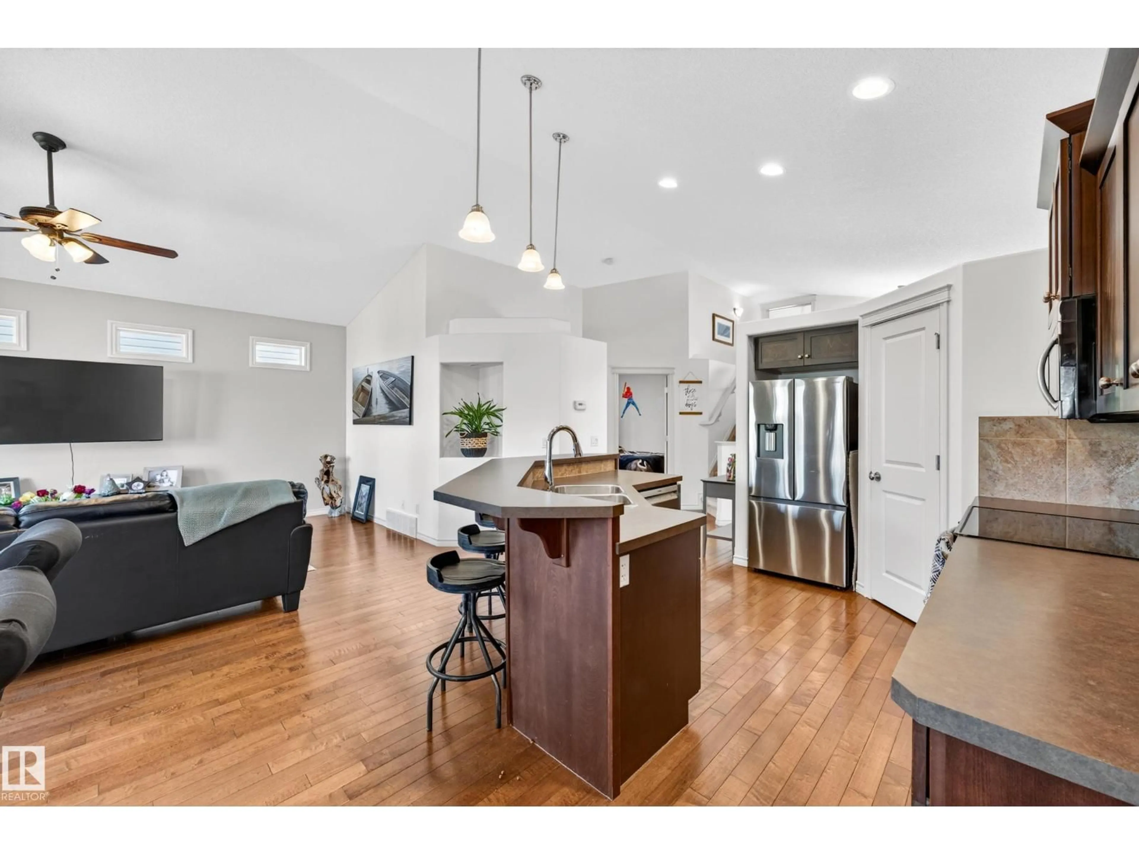 Open concept kitchen, wood/laminate floor for 100 NAPOLEON CR, St. Albert Alberta T8N3L8