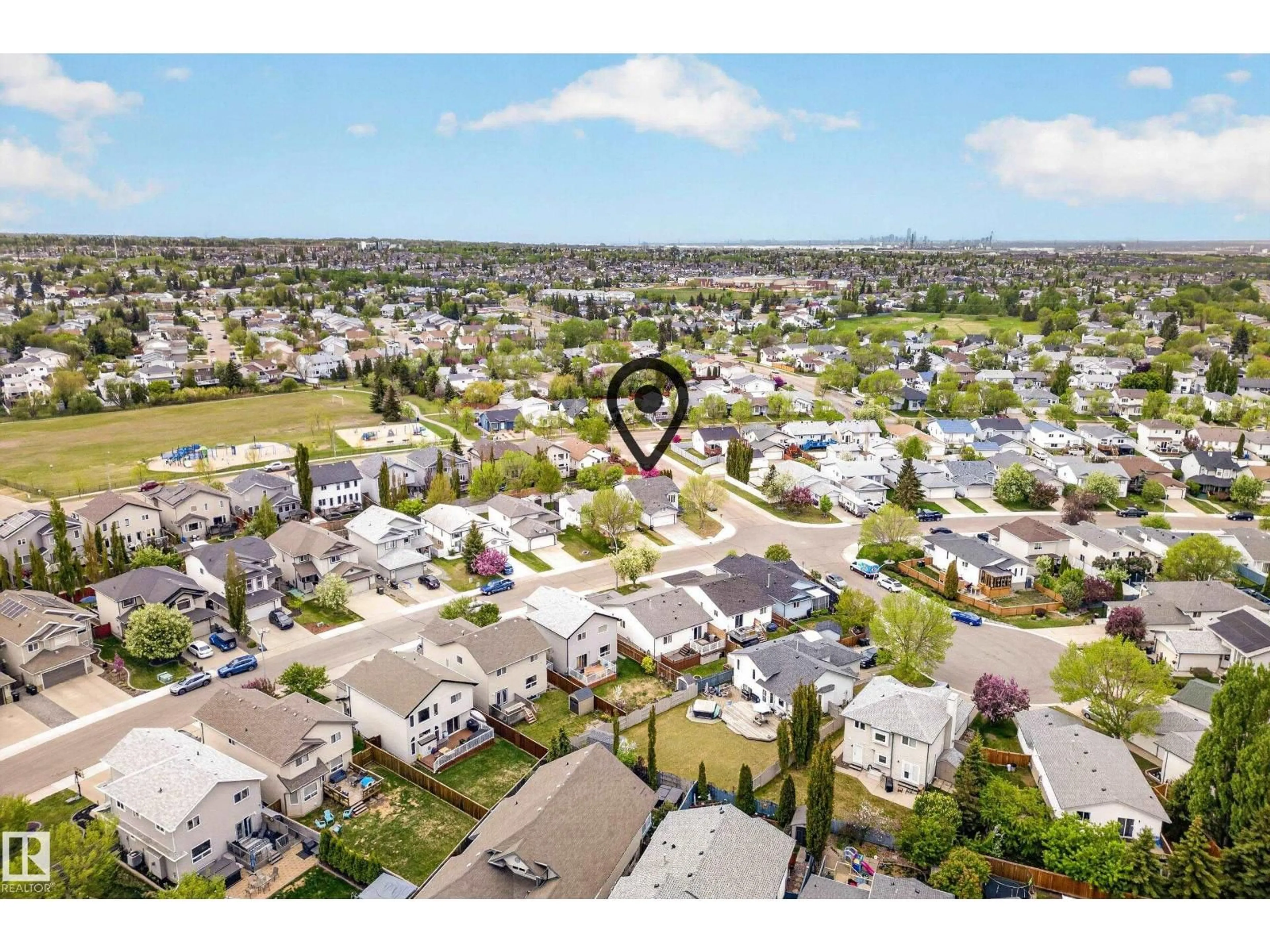 A pic from outside/outdoor area/front of a property/back of a property/a pic from drone, mountain view for 22 DORIAN WY, Sherwood Park Alberta T8H1Y2