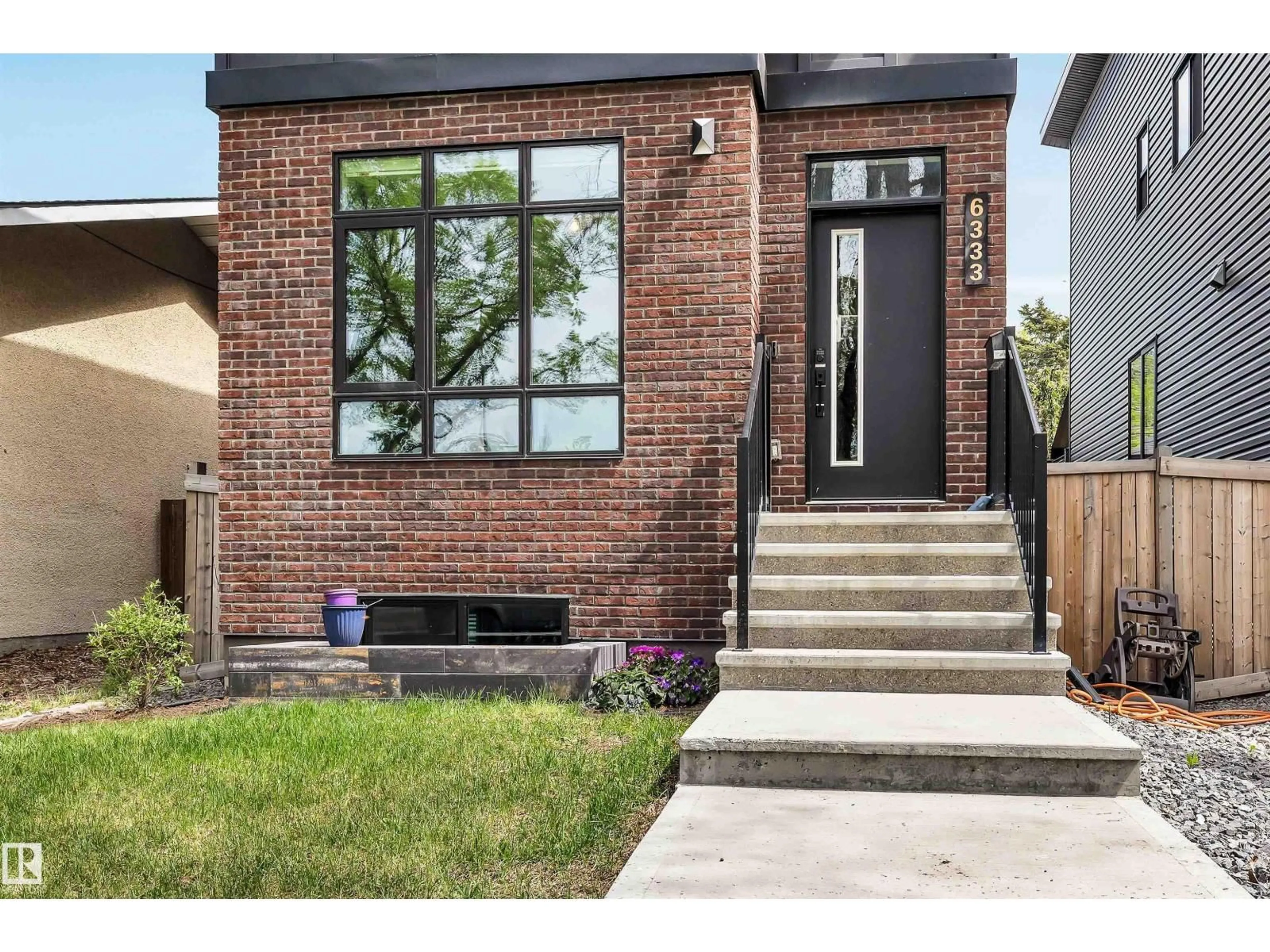 Home with brick exterior material, street for 6333 105A ST NW, Edmonton Alberta T6H2P9