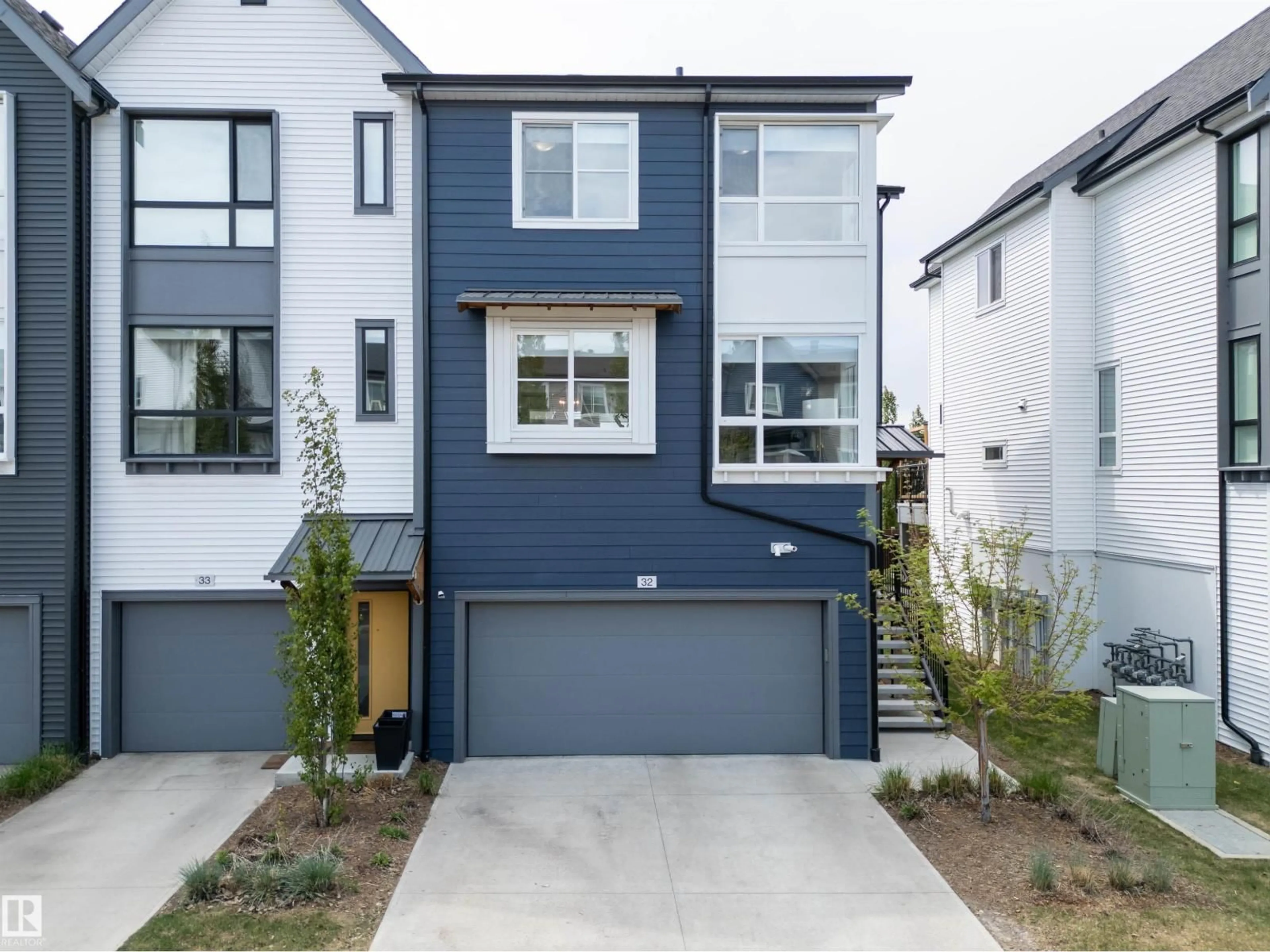 Home with vinyl exterior material, street for 32 100 JENSEN LAKES BV, St. Albert Alberta T8N7T9