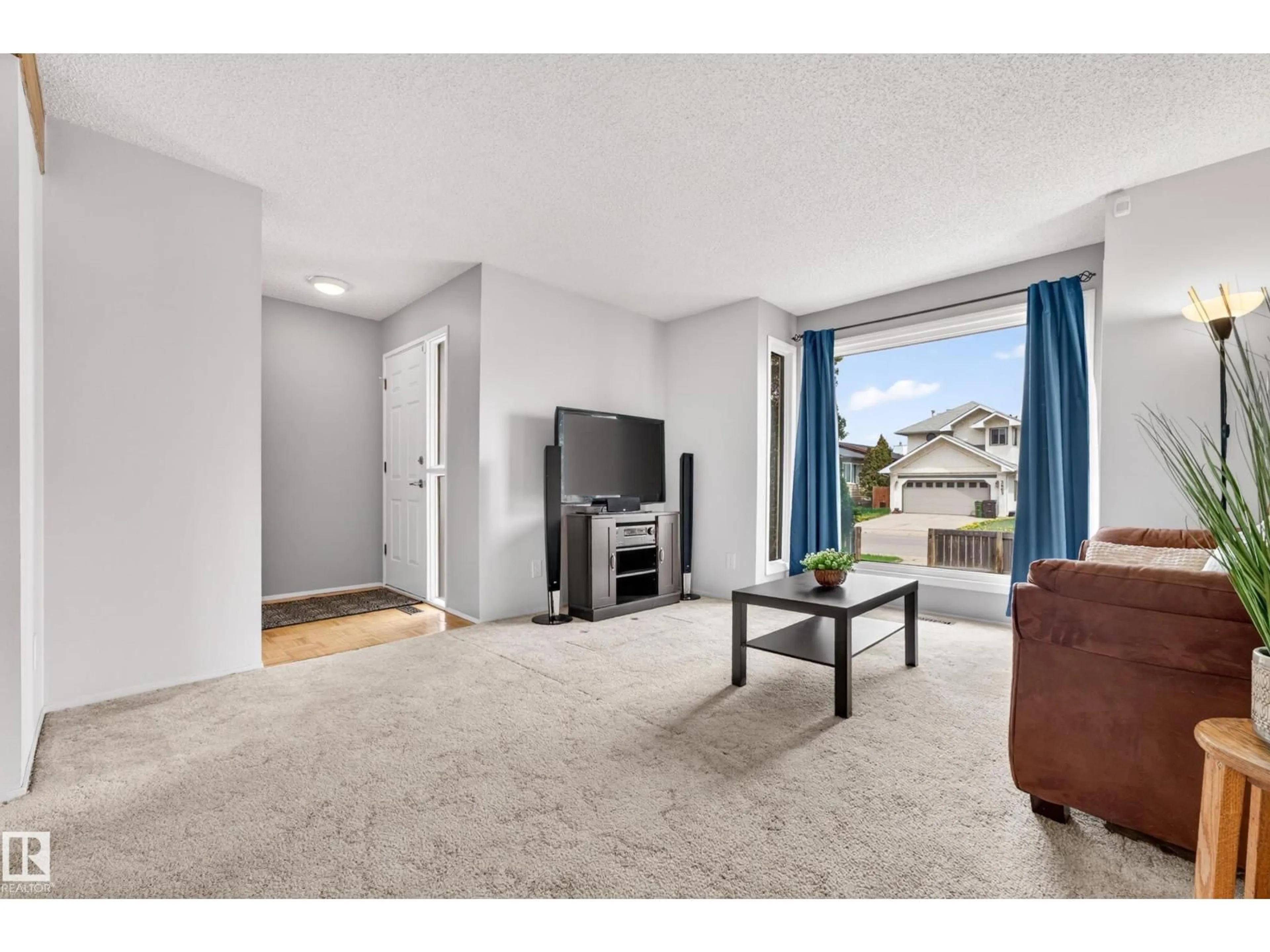Living room with furniture, unknown for 3004 36 ST, Edmonton Alberta T6L4V9