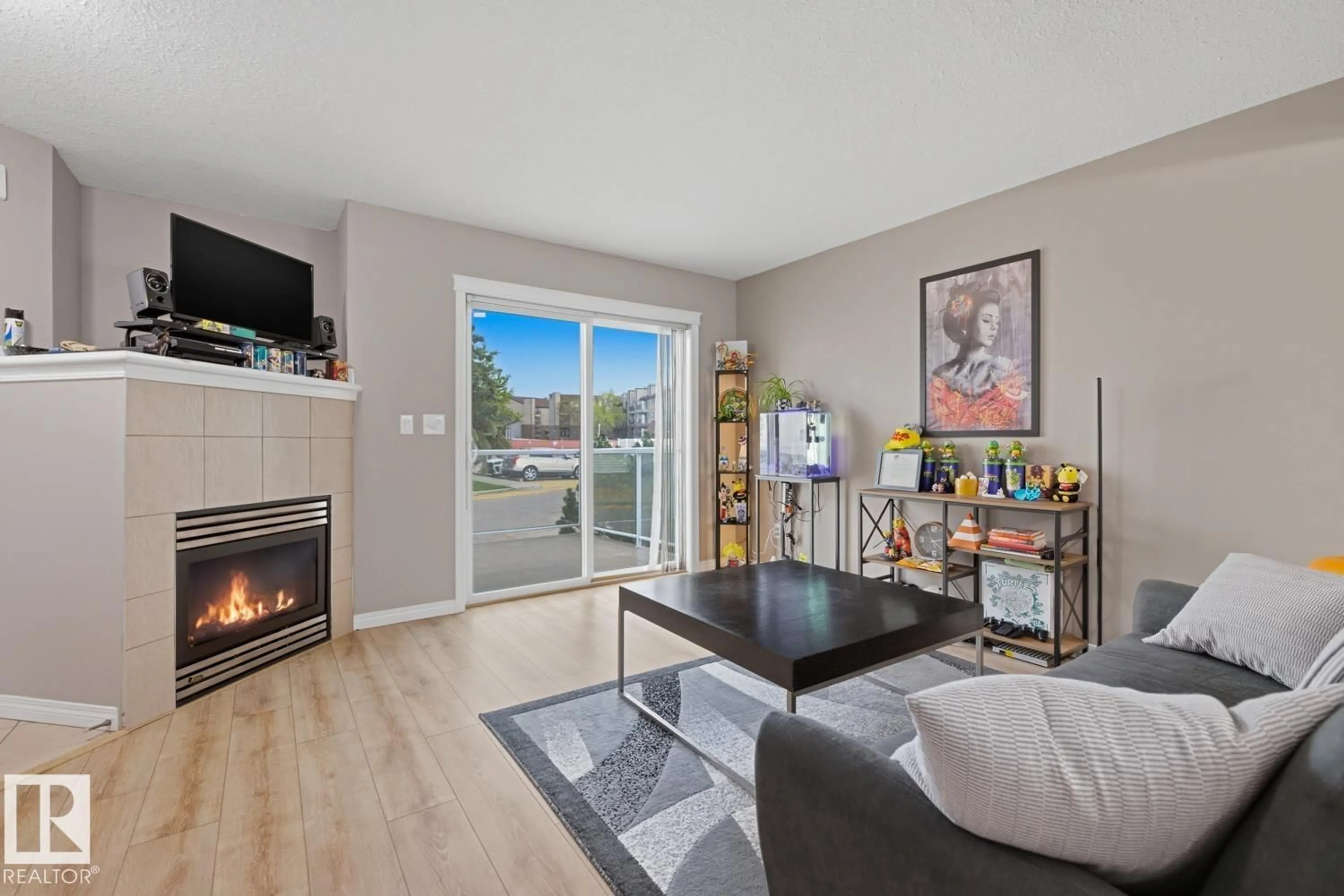 Living room with furniture, wood/laminate floor for #6 - 2505 42 ST, Edmonton Alberta T6L7G8