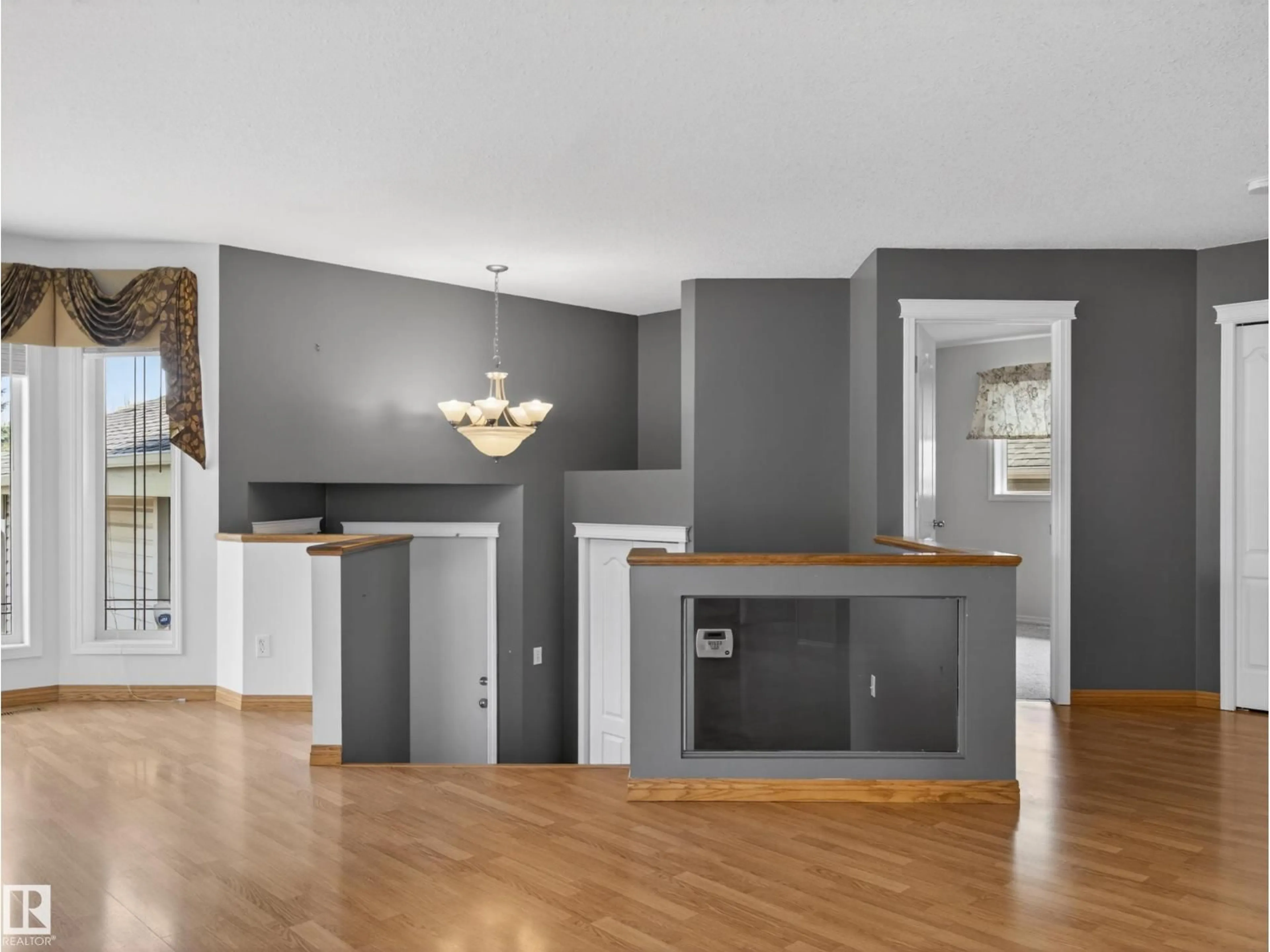 Open concept kitchen, wood/laminate floor for 108 RIDGEPOINT WY, Sherwood Park Alberta T8A6B3