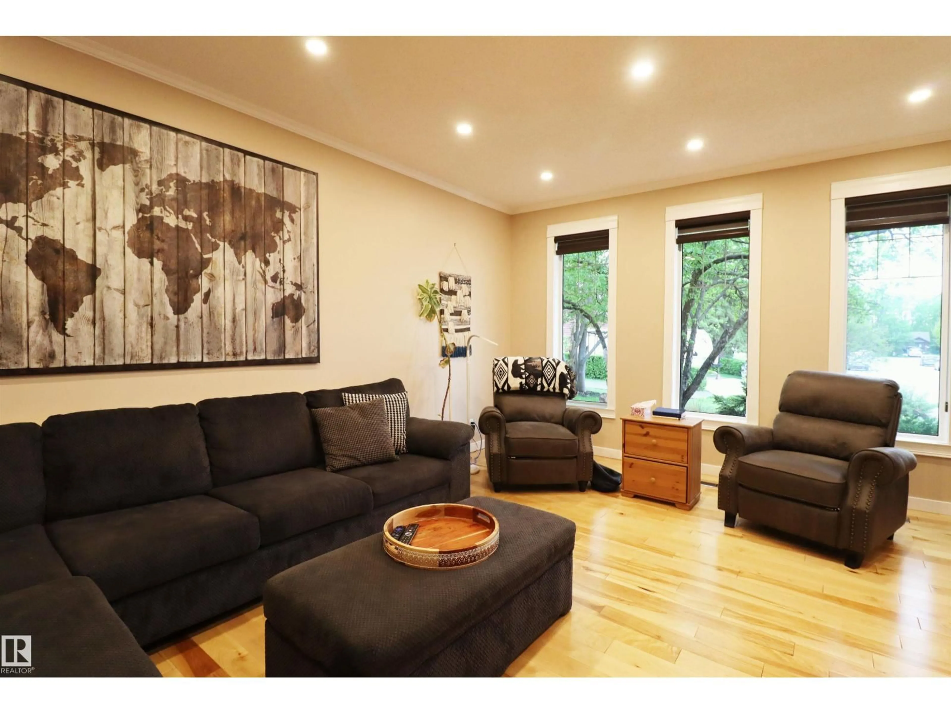 Living room with furniture, wood/laminate floor for 6 MARLBORO PL, Spruce Grove Alberta T7X2P1
