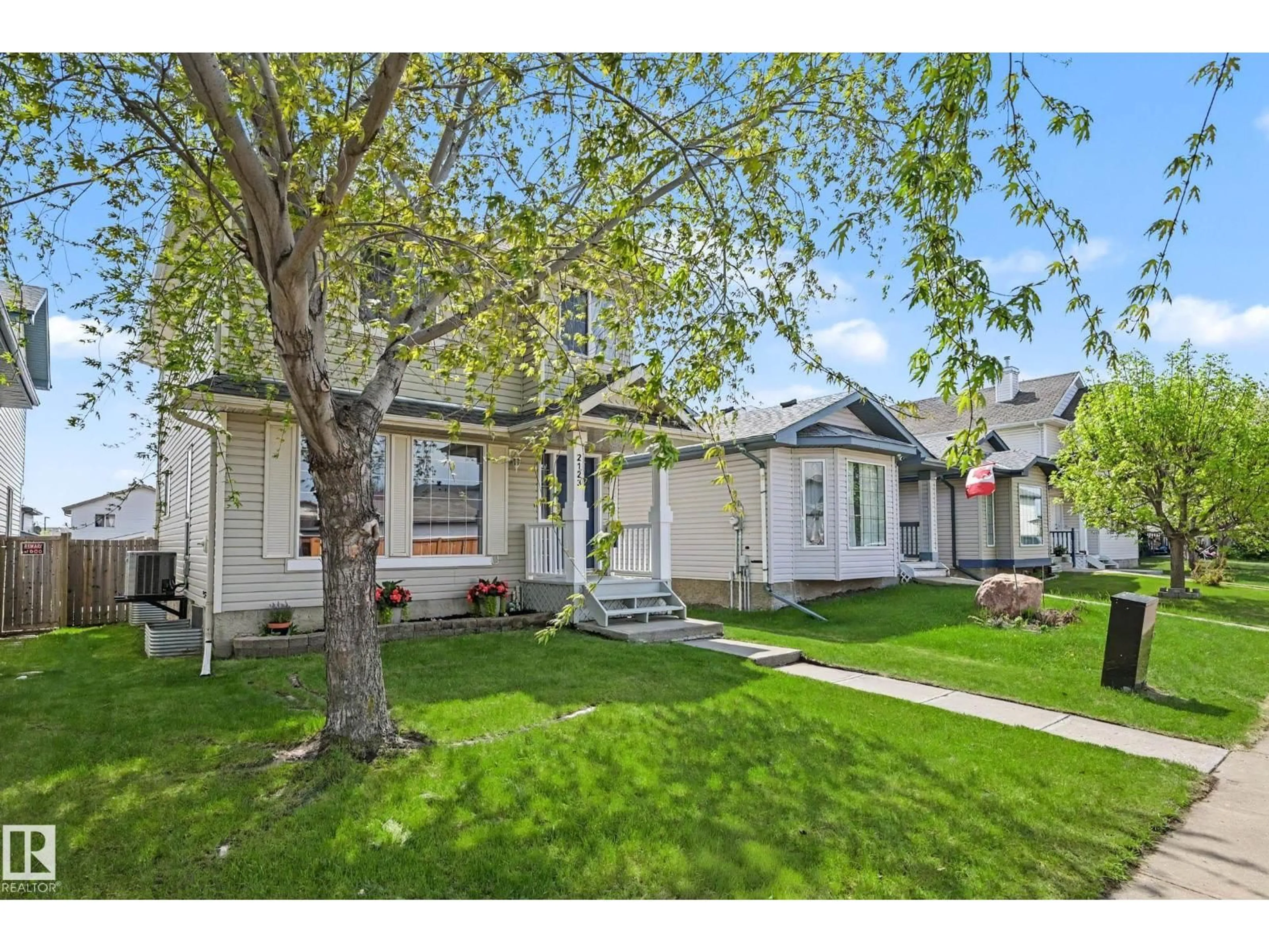 A pic from outside/outdoor area/front of a property/back of a property/a pic from drone, street for 2123 36 AV, Edmonton Alberta T6T1S3