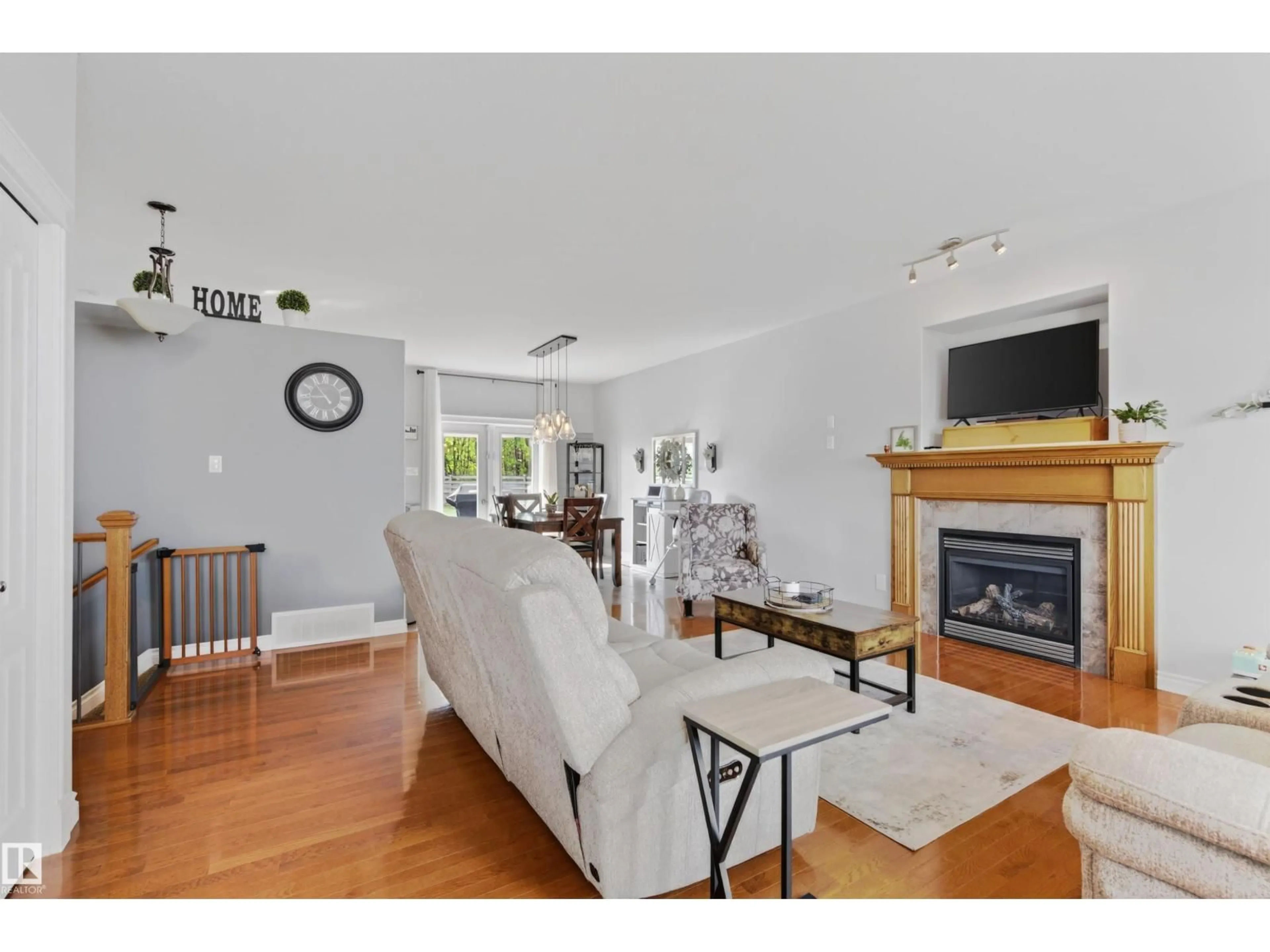 Living room with furniture, wood/laminate floor for 2014 6 ST, Cold Lake Alberta T9M0A2