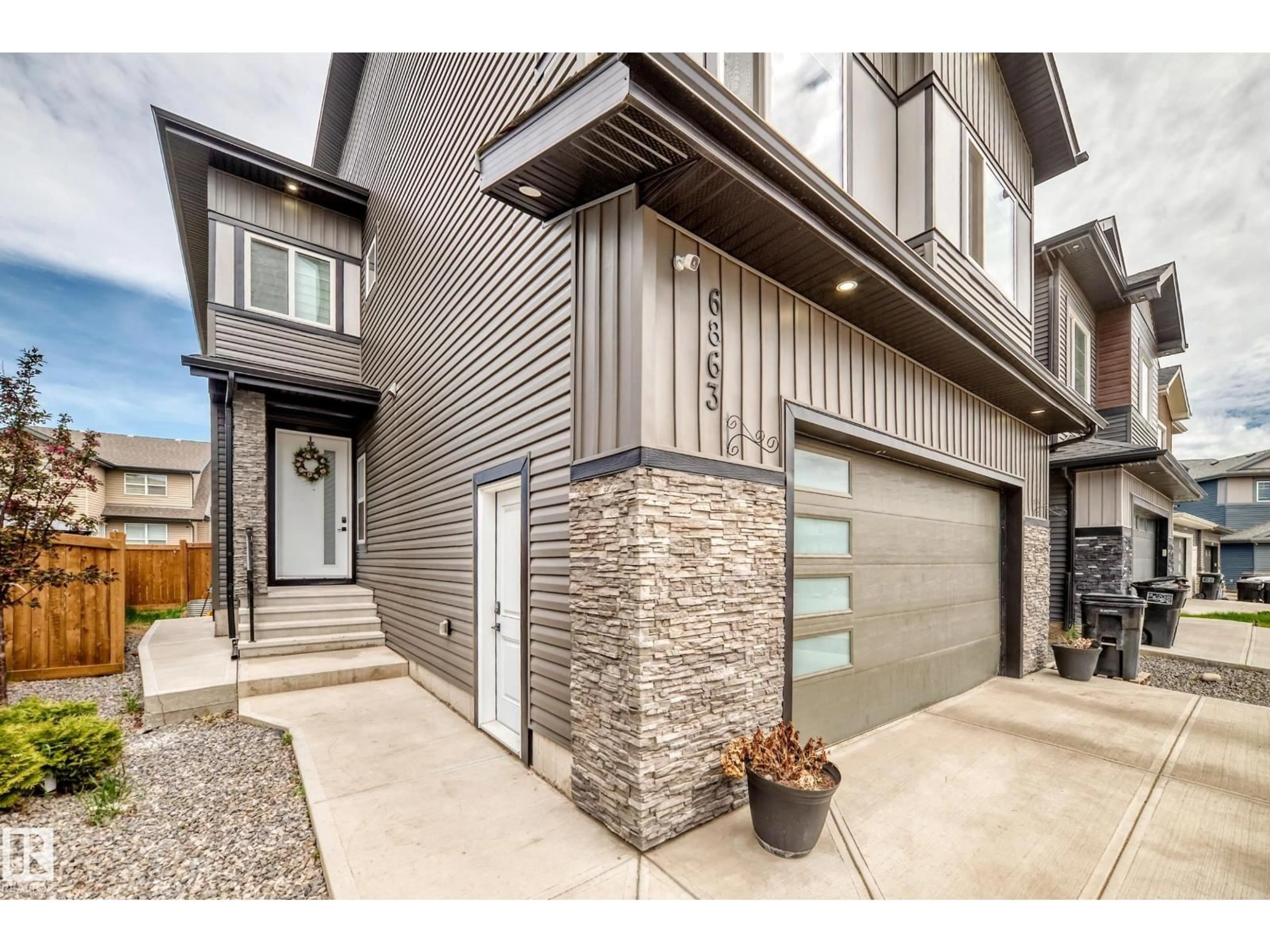 Home with brick exterior material, street for 6863 171 AV, Edmonton Alberta T5Z0W2
