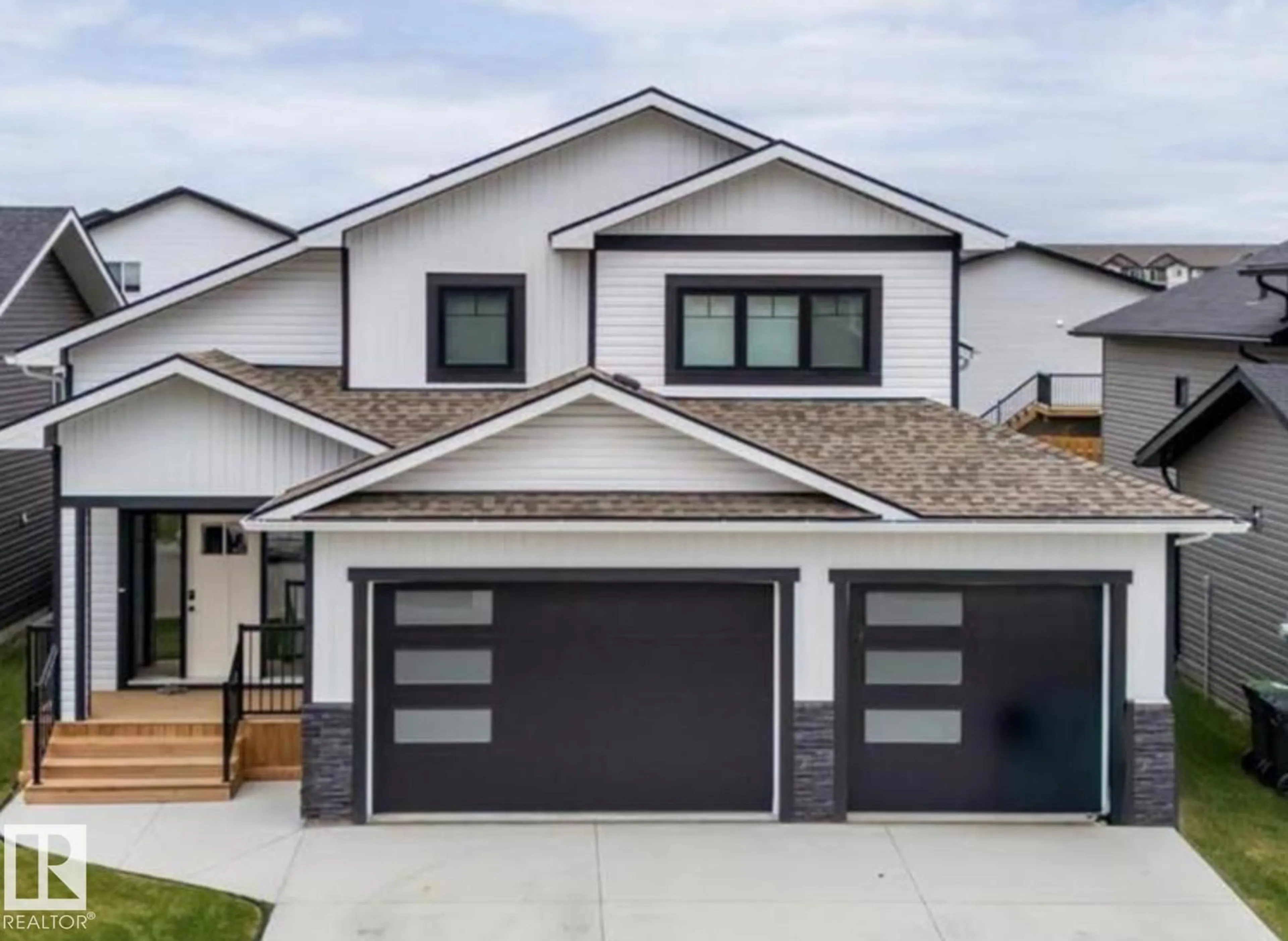 Home with vinyl exterior material, street for 301 FUNDY WY, Cold Lake Alberta T9M0M4