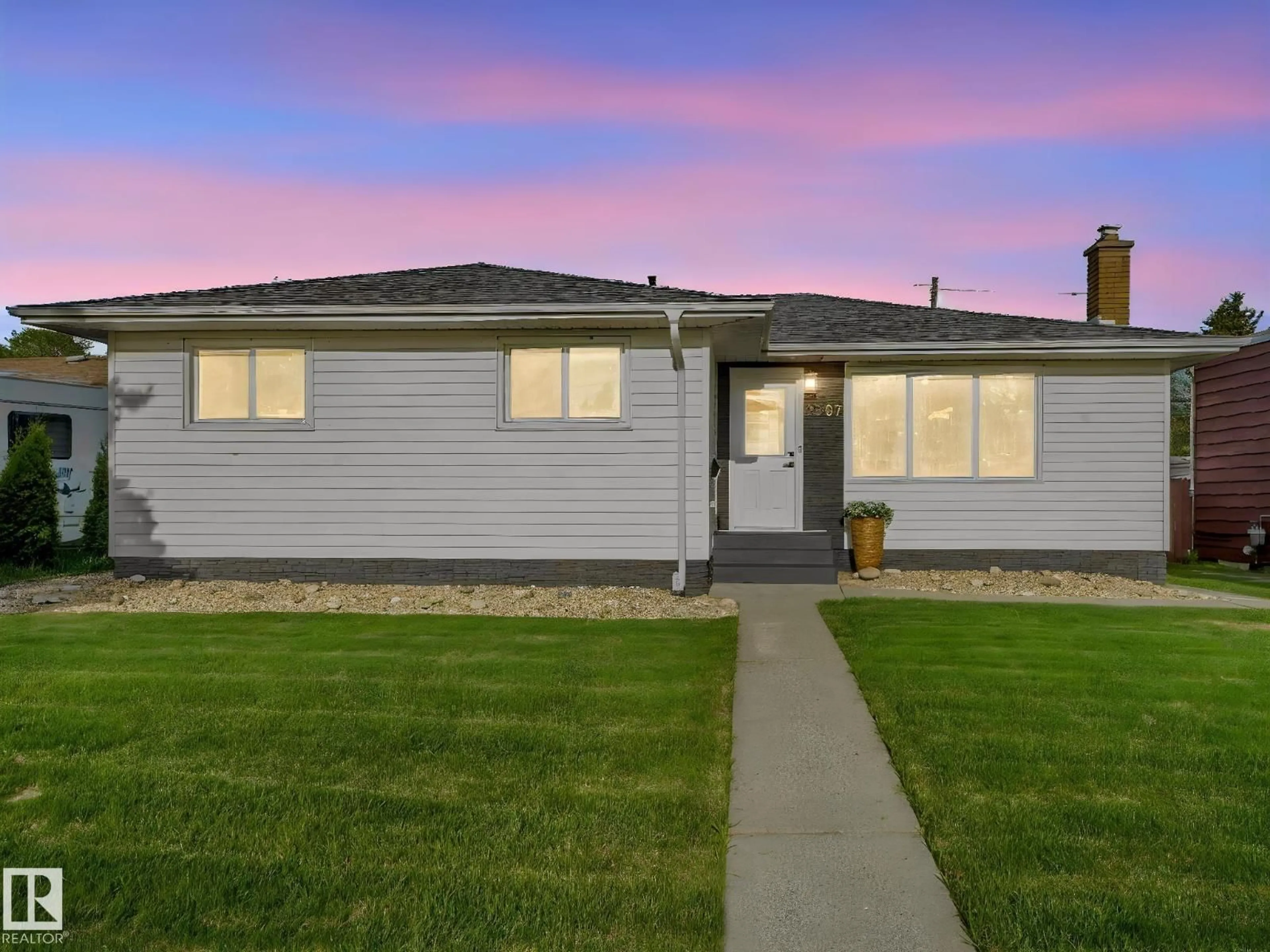 Home with vinyl exterior material, street for 9207 169 ST, Edmonton Alberta T5R2X3