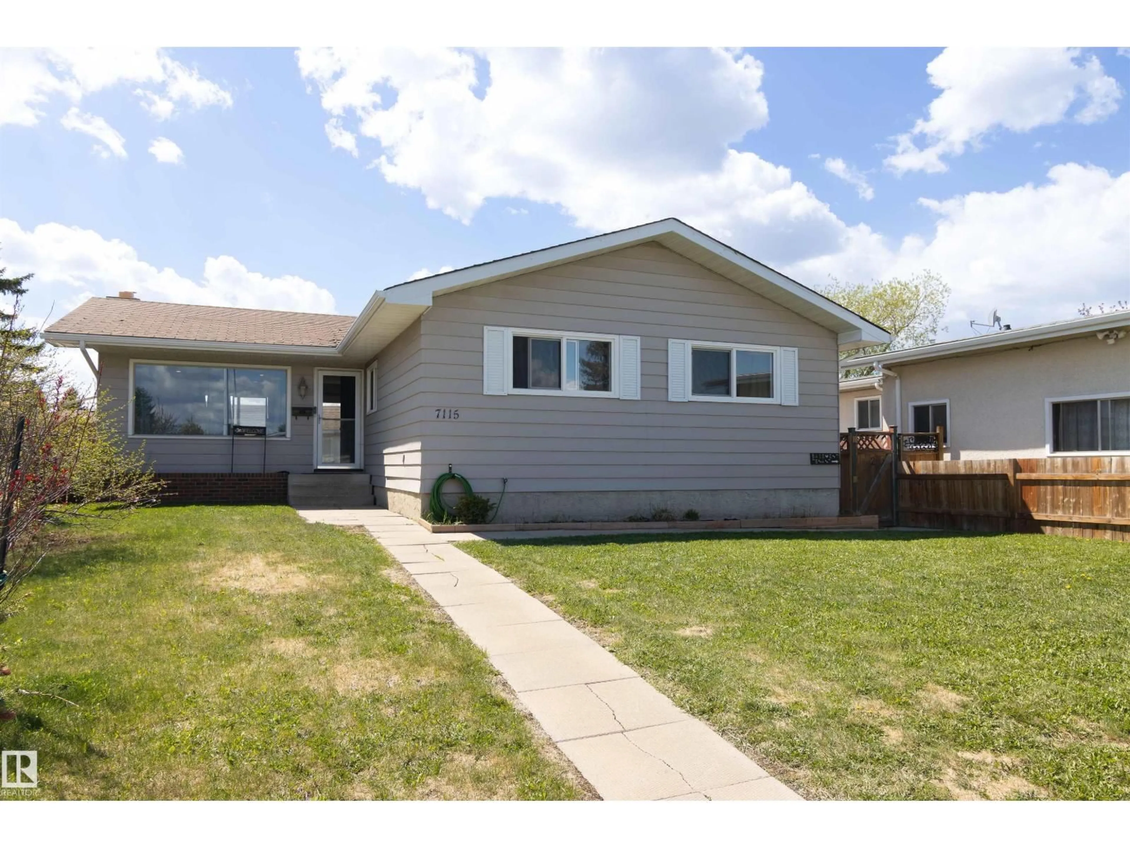 Home with vinyl exterior material, street for 7115 39A AV, Edmonton Alberta T6K0R7