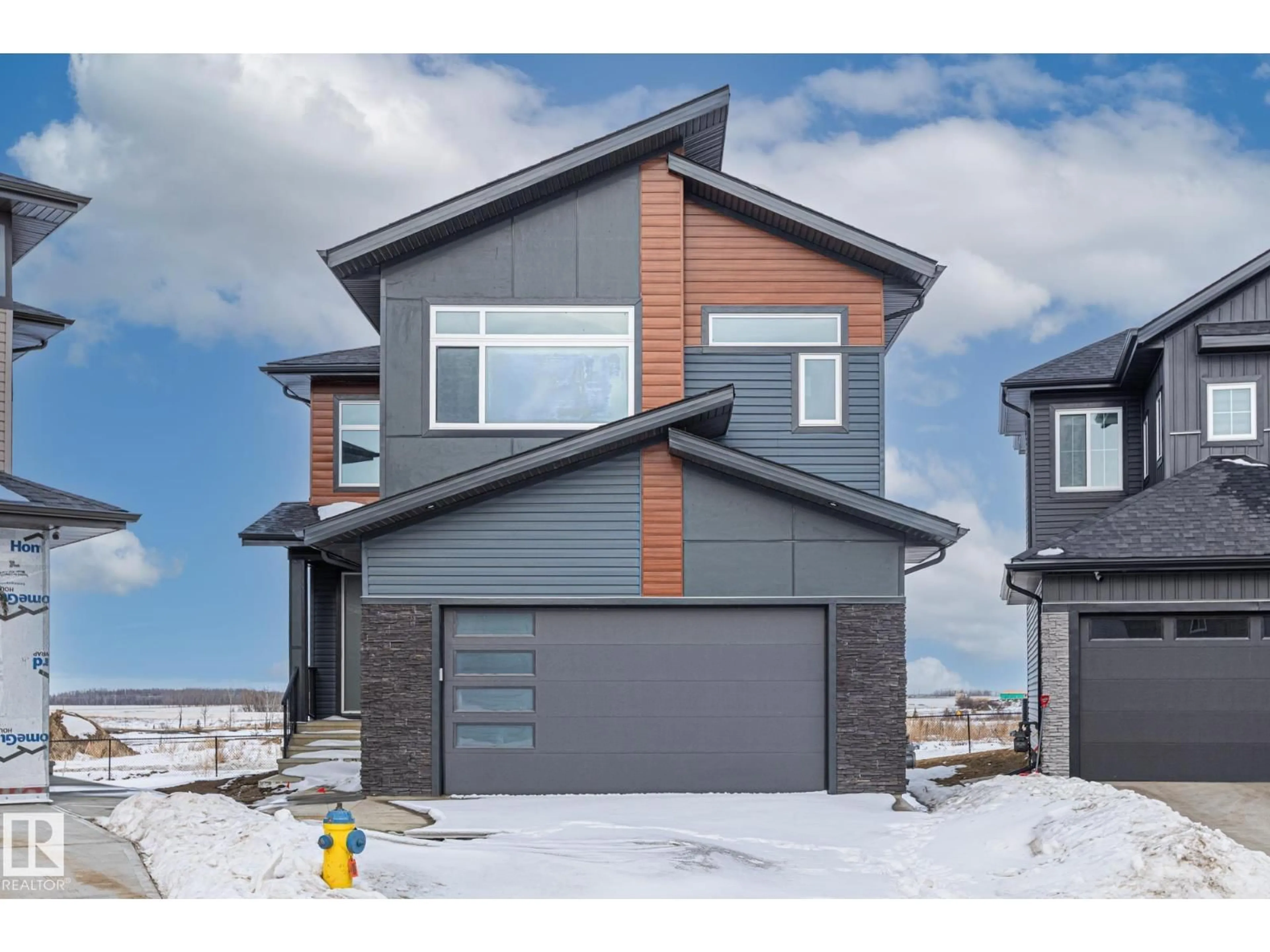 Home with brick exterior material, street for 416 PINE PT, Leduc Alberta T9E1S7