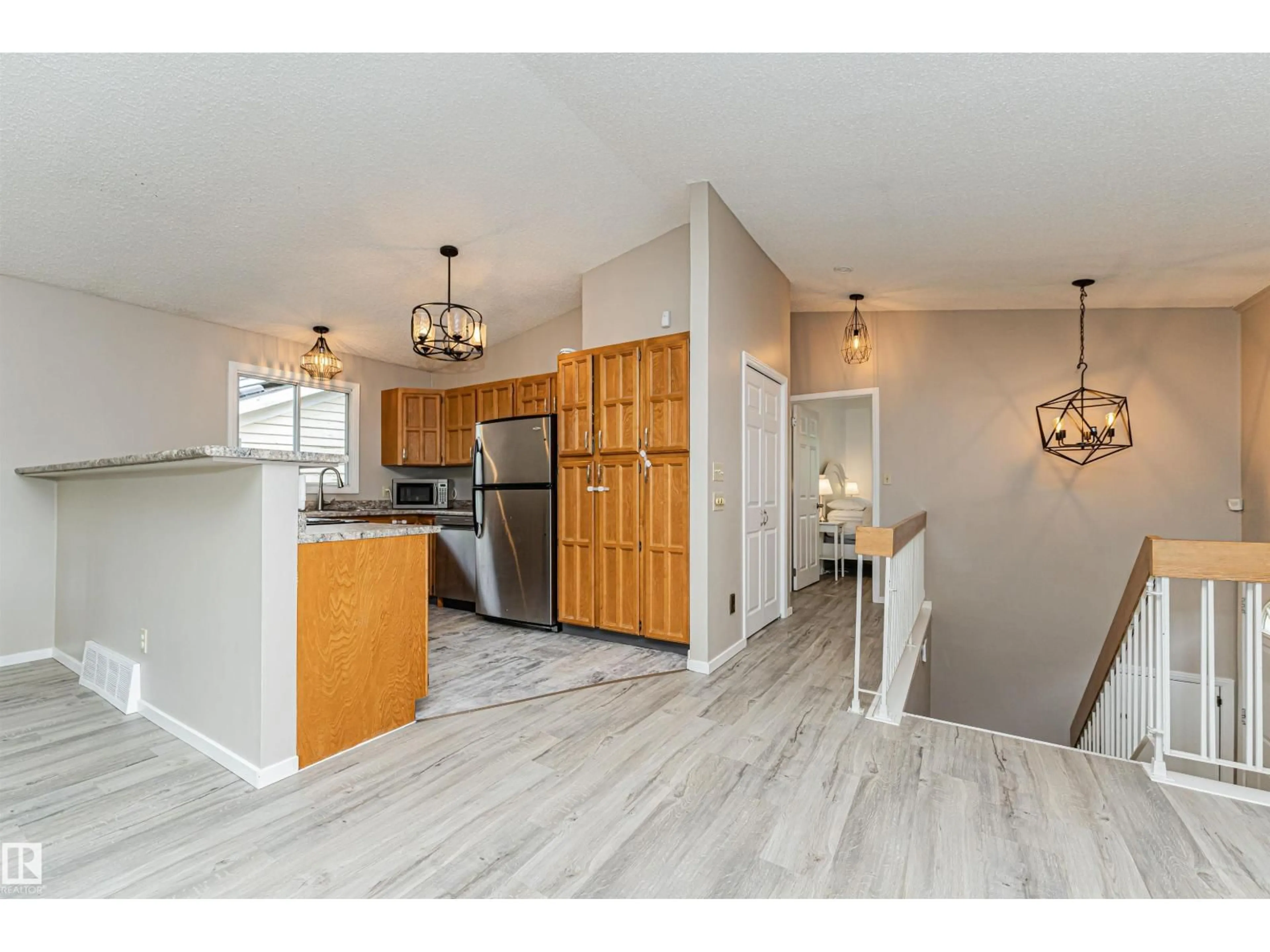 Open concept kitchen, unknown for 11013 81 AV, Edmonton Alberta T6G0S3