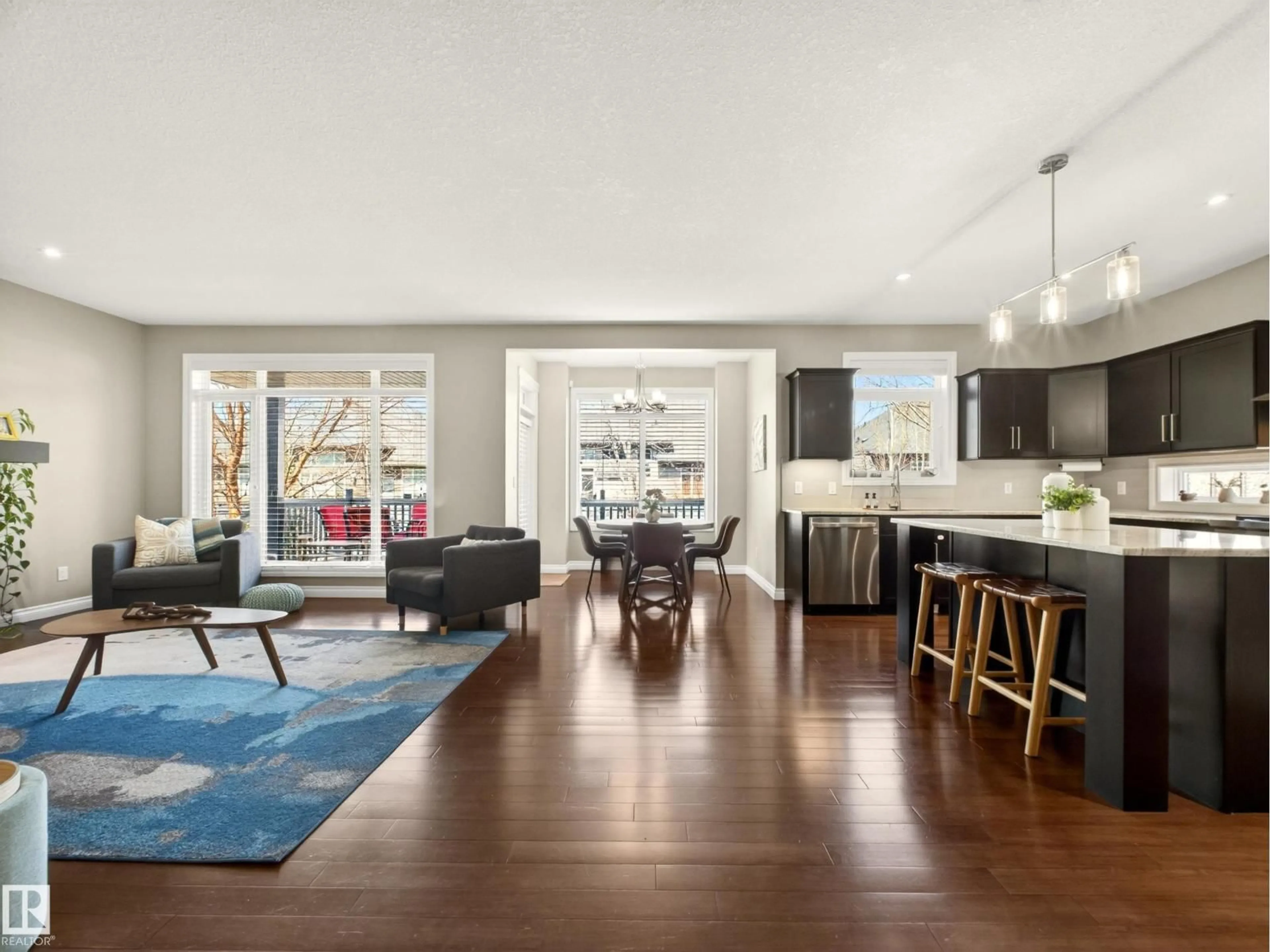 Open concept kitchen, wood/laminate floor for 5610 PIERRE CO, Beaumont Alberta T4X0E1