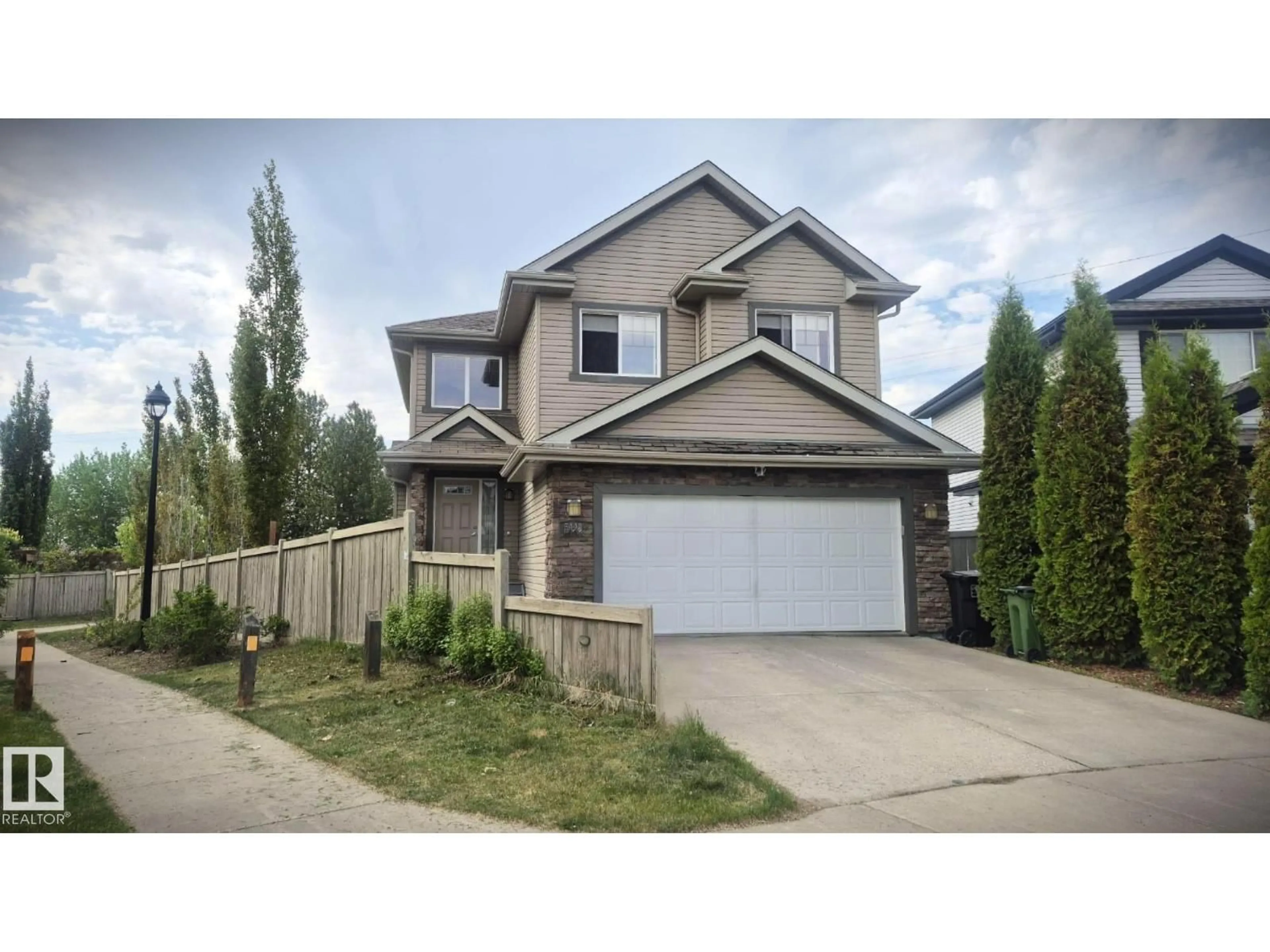Home with vinyl exterior material, street for SW - 5440 1A AV, Edmonton Alberta T6X0L2