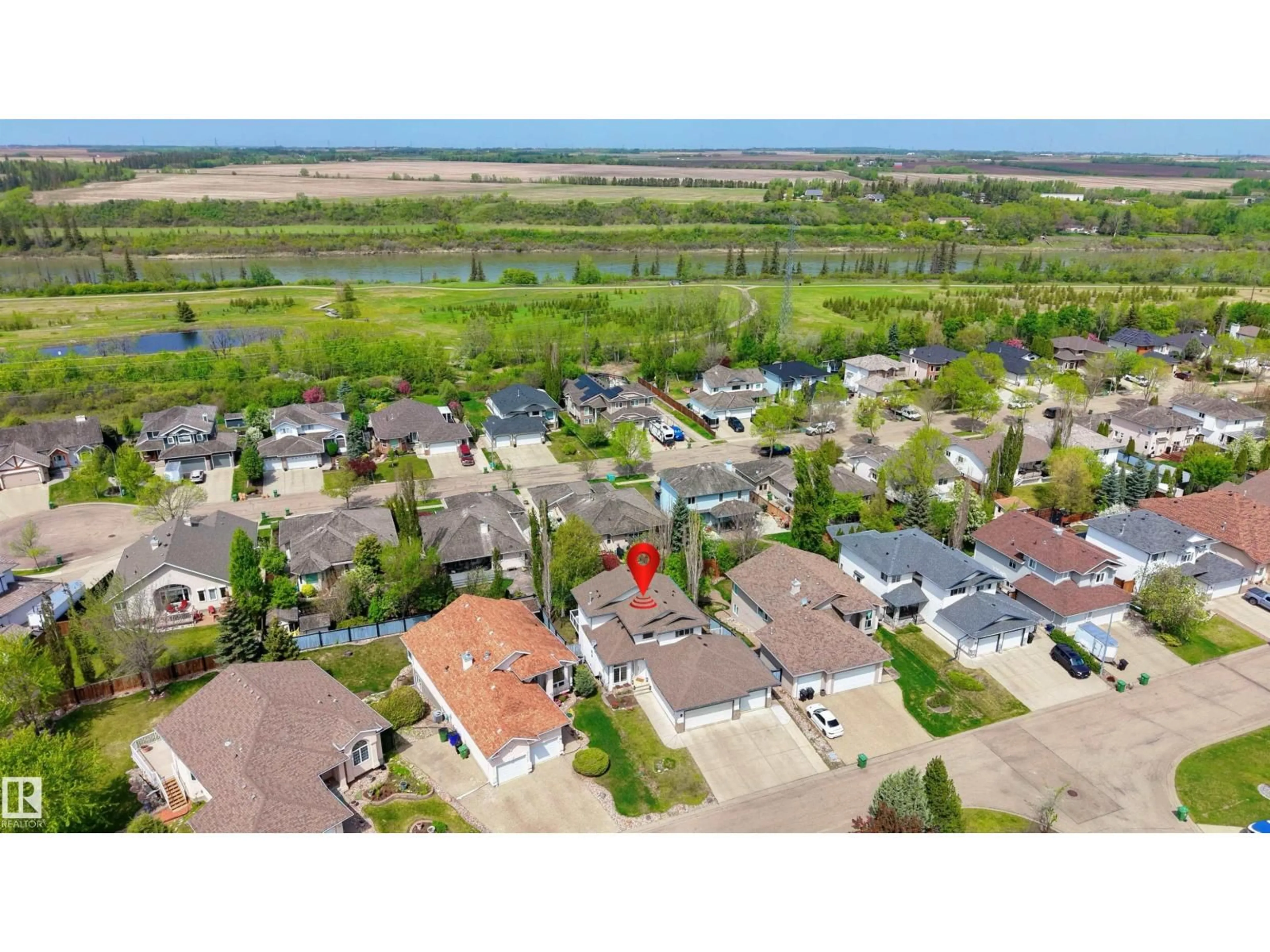 A pic from outside/outdoor area/front of a property/back of a property/a pic from drone, water/lake/river/ocean view for 52 WESTPARK WD, Fort Saskatchewan Alberta T8L4K9