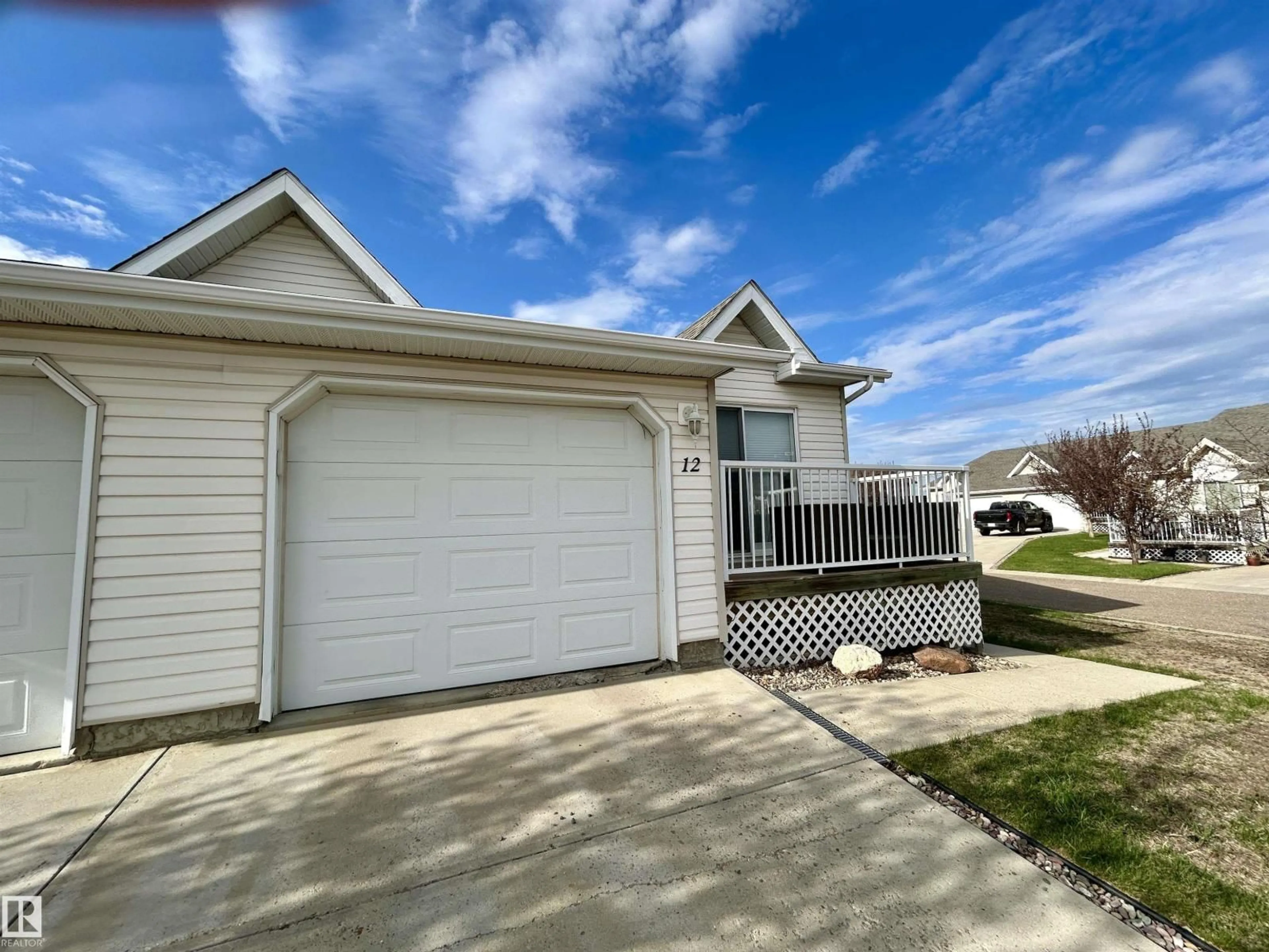 Home with vinyl exterior material, water/lake/river/ocean view for 12 5104 18 ST, Lloydminster Alberta T9V0A8