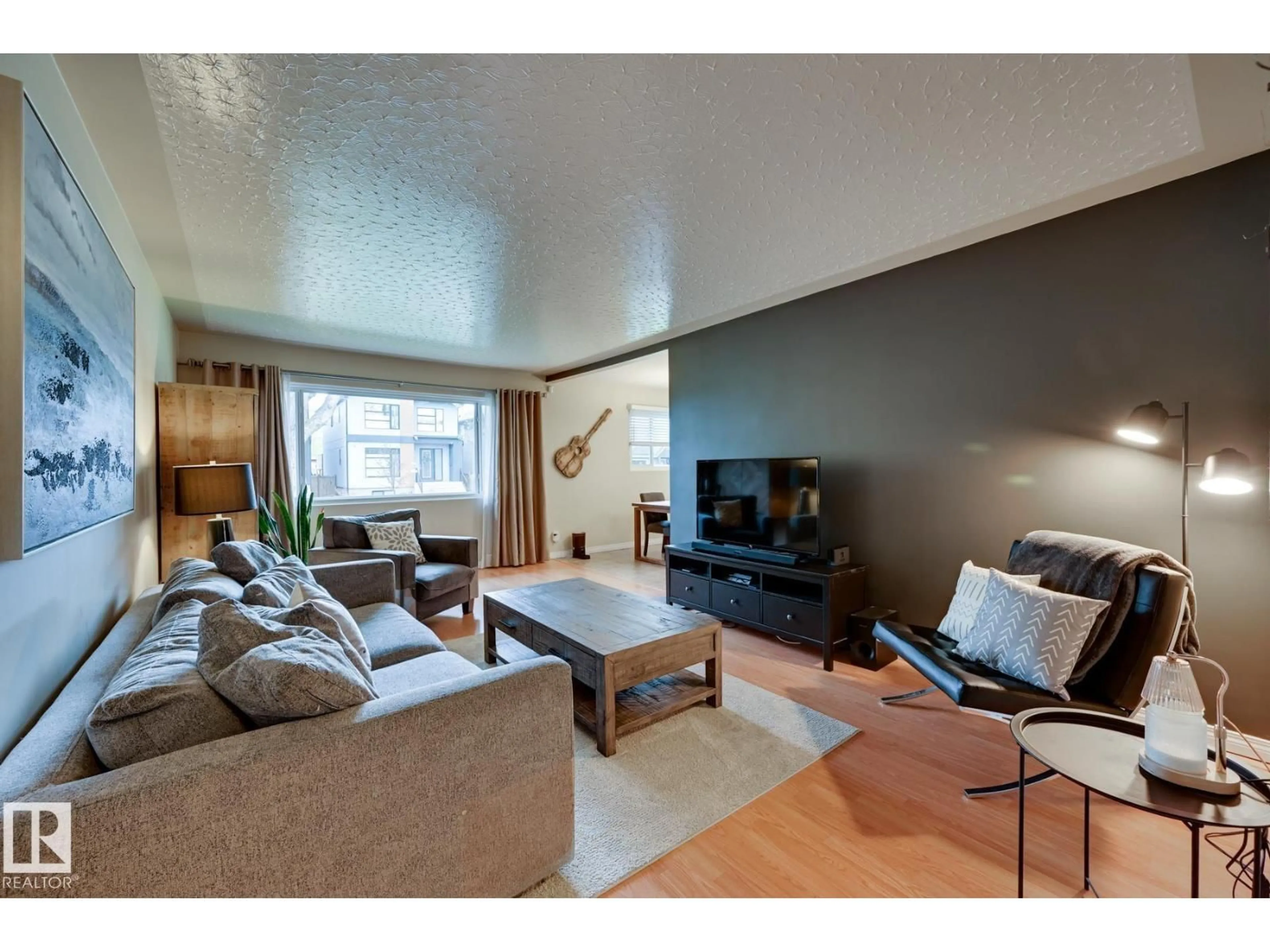 Living room with furniture, unknown for 7527 78 AV, Edmonton Alberta T6C0M6