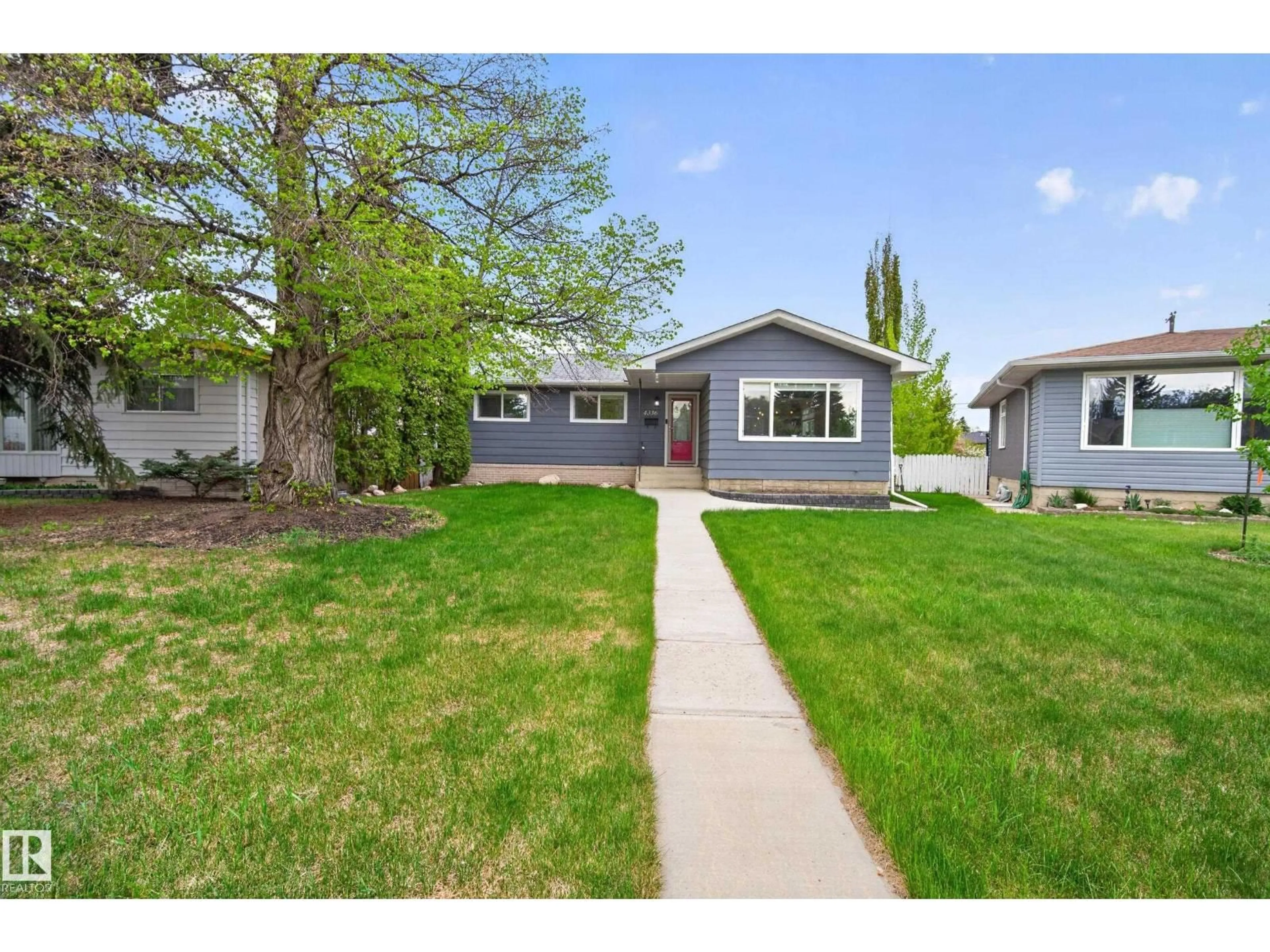 Home with vinyl exterior material, street for 4336 116 ST NW, Edmonton Alberta T6J1R9
