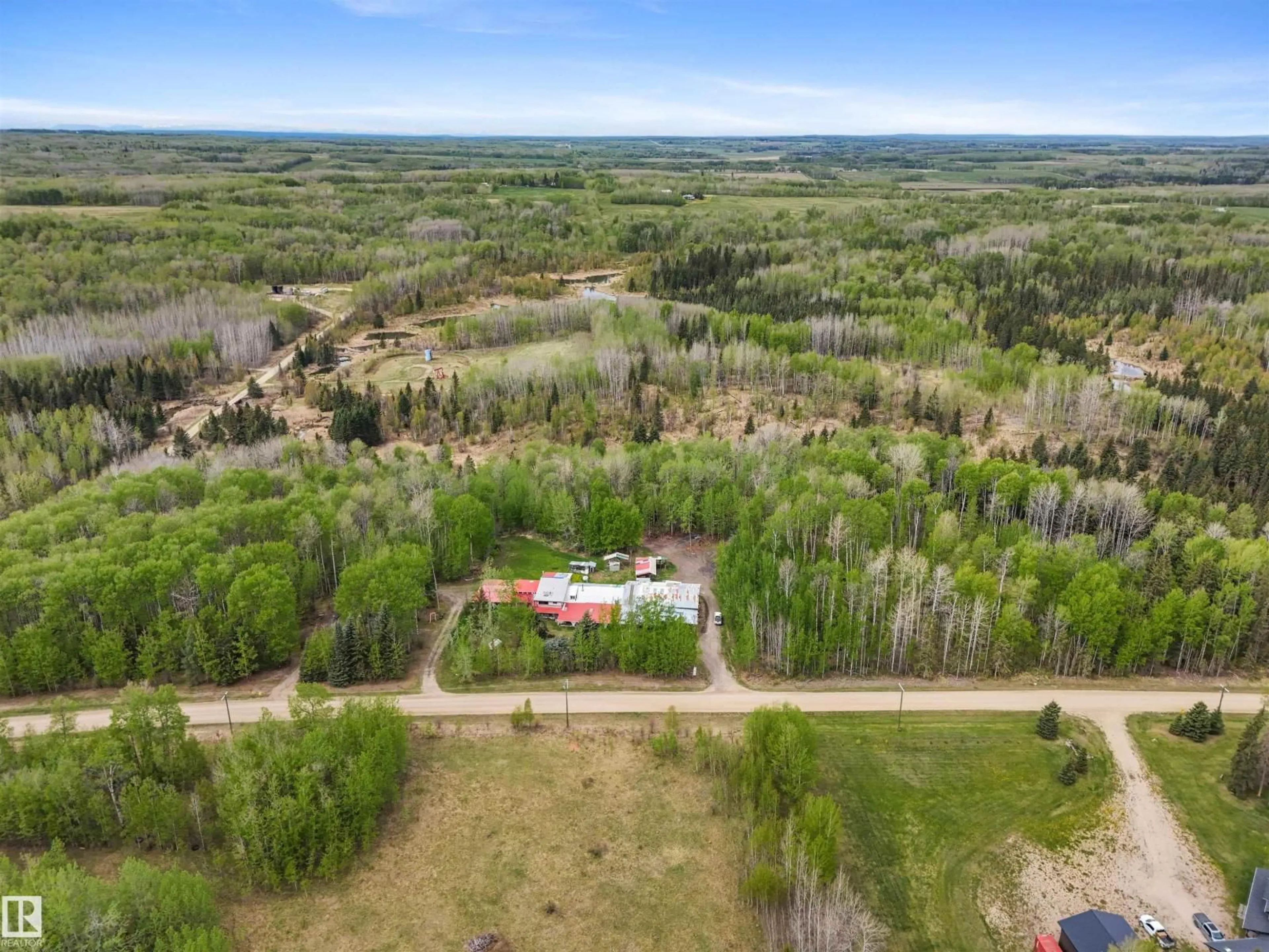 A pic from outside/outdoor area/front of a property/back of a property/a pic from drone, forest/trees view for 453038 RGE ROAD 61, Rural Wetaskiwin County Alberta T0C0A0