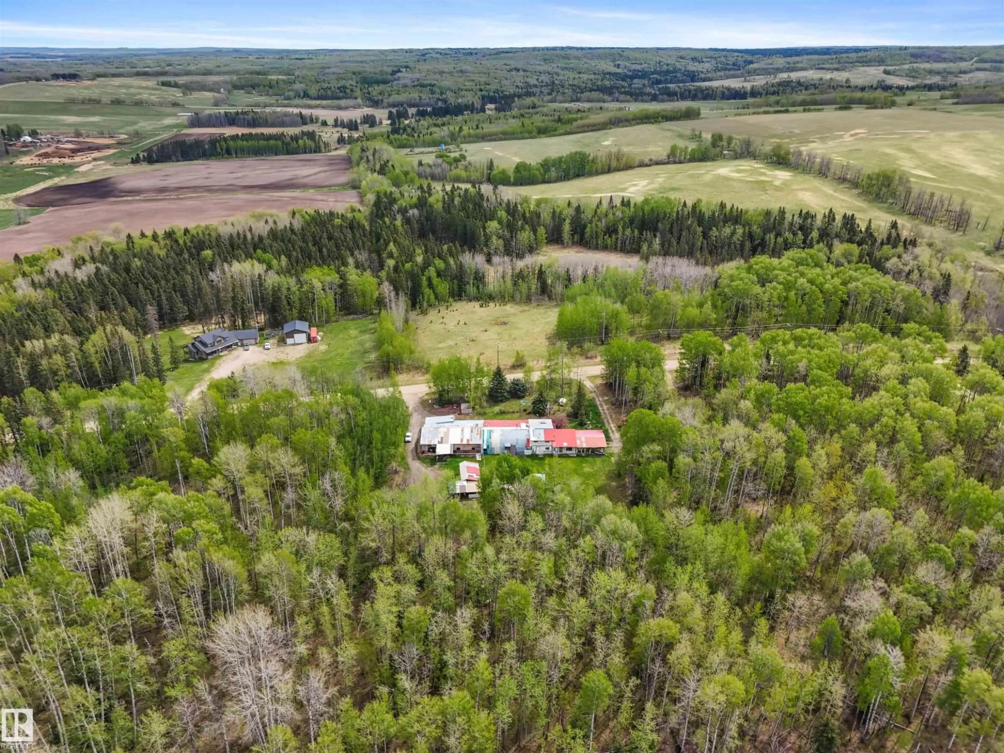A pic from outside/outdoor area/front of a property/back of a property/a pic from drone, forest/trees view for 453038 RGE ROAD 61, Rural Wetaskiwin County Alberta T0C0A0